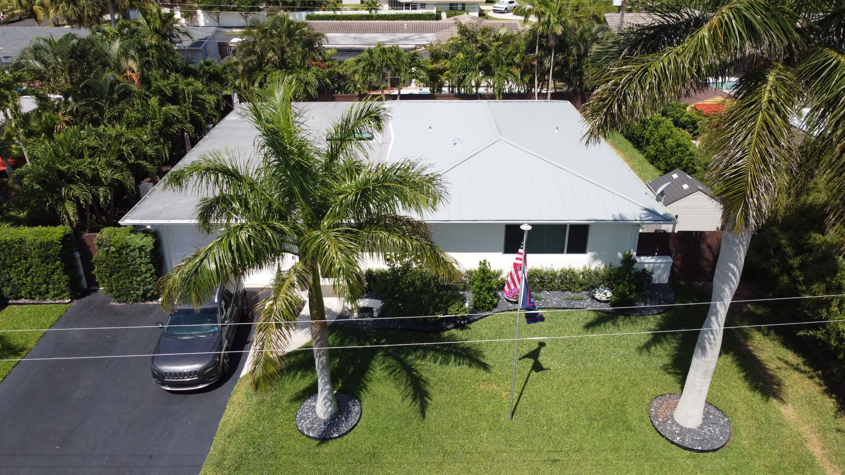 Residential Roofing Installation using 1" Nail strip metal roof by BLUES BROTHERS CONSTRUCTION CORP