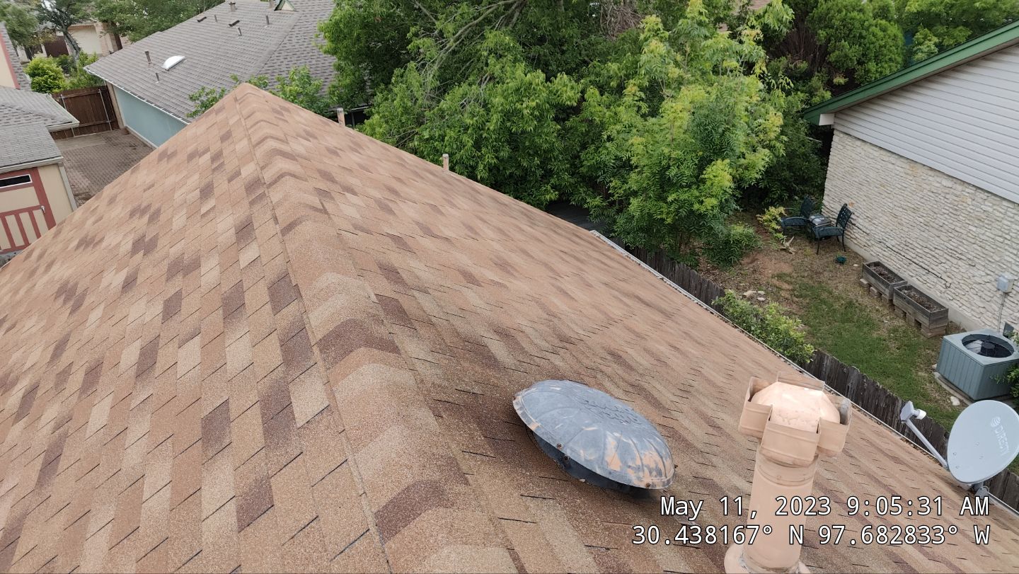 New Roof Installation Of IKO Dynasty Color Brownstone by DeZign Roofing & Exteriors