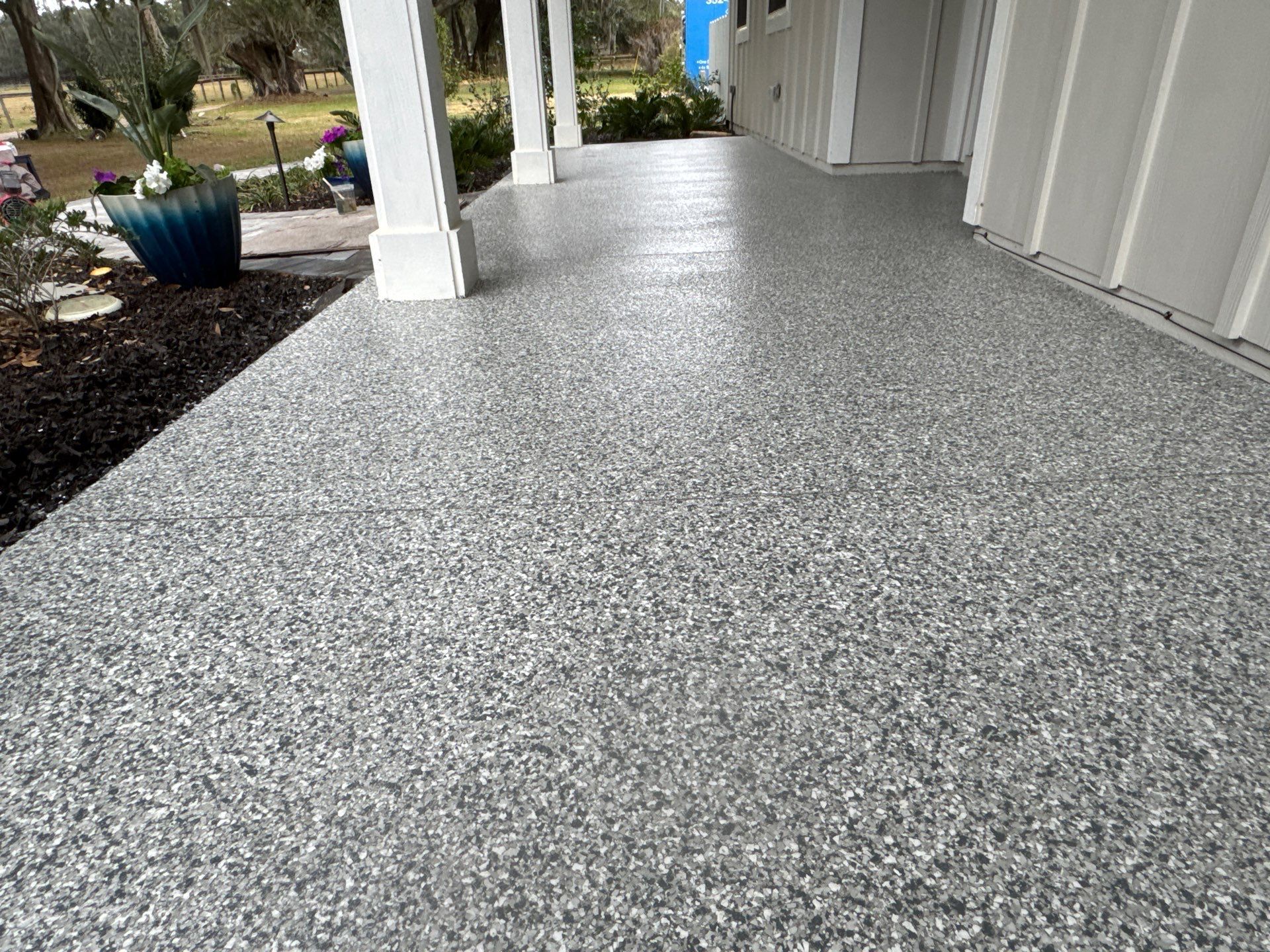 Front and Back Porches  in Micanopy, FL (Front Porch: Slate Stone, Back Porch: Mount Everest) by Cross Creek Concrete Coatings