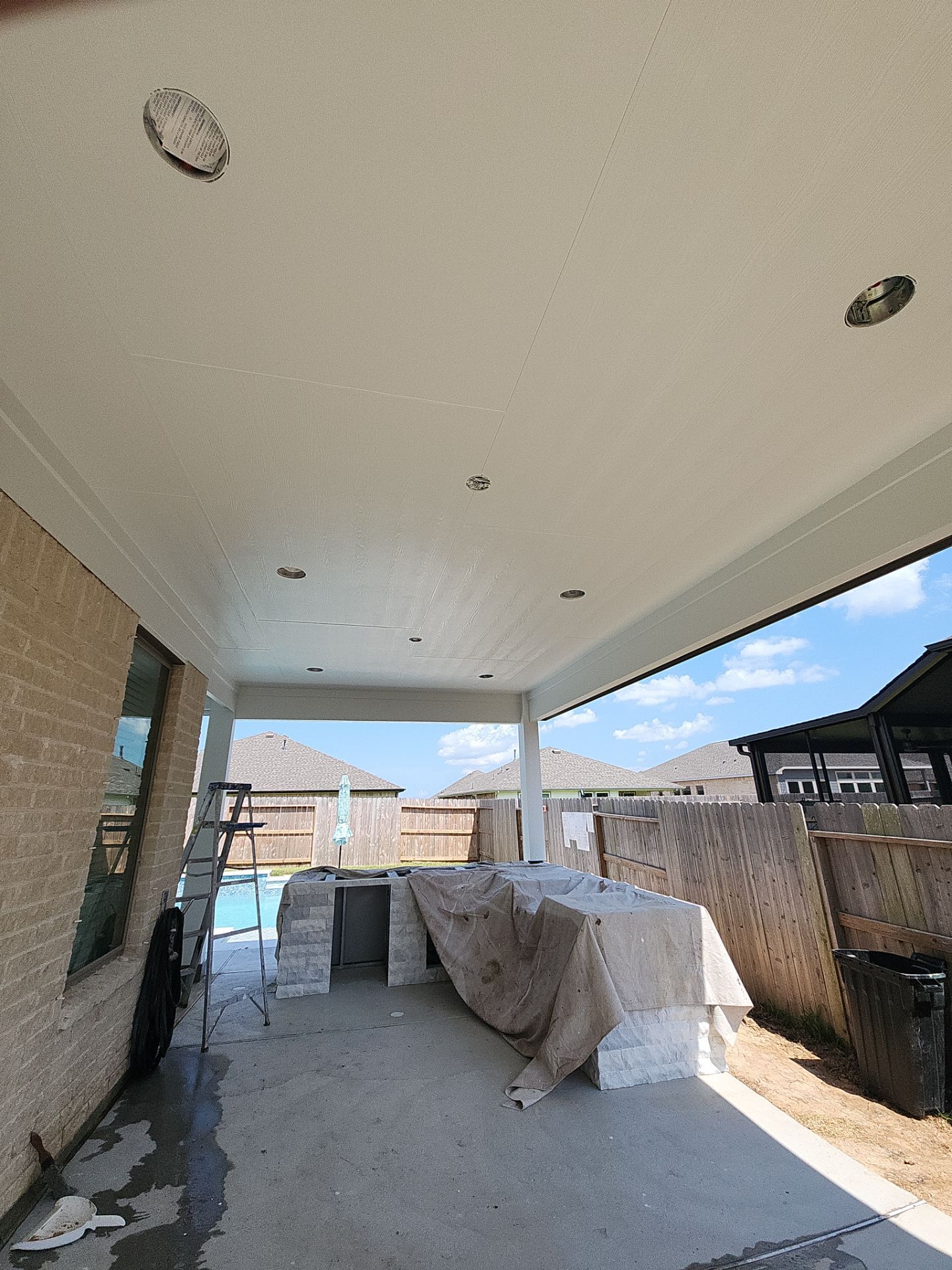 Patio and Summer Kitchen in Texas city by SophAlx LLC