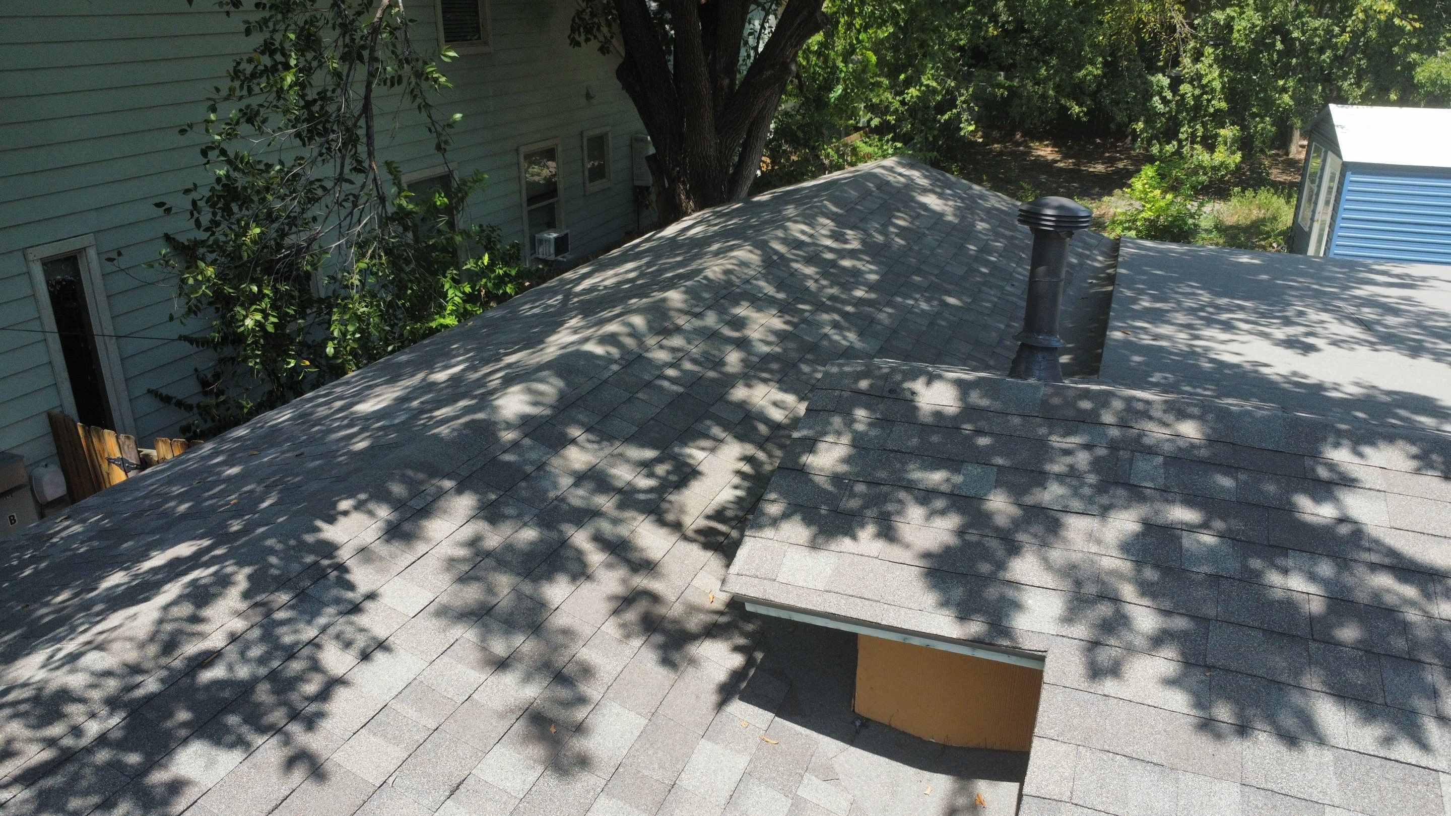 Mixed Roof System ā Oakridge Driftwood + Flat Roof Section | Austin, TX by Kstylez Roofing & Construction