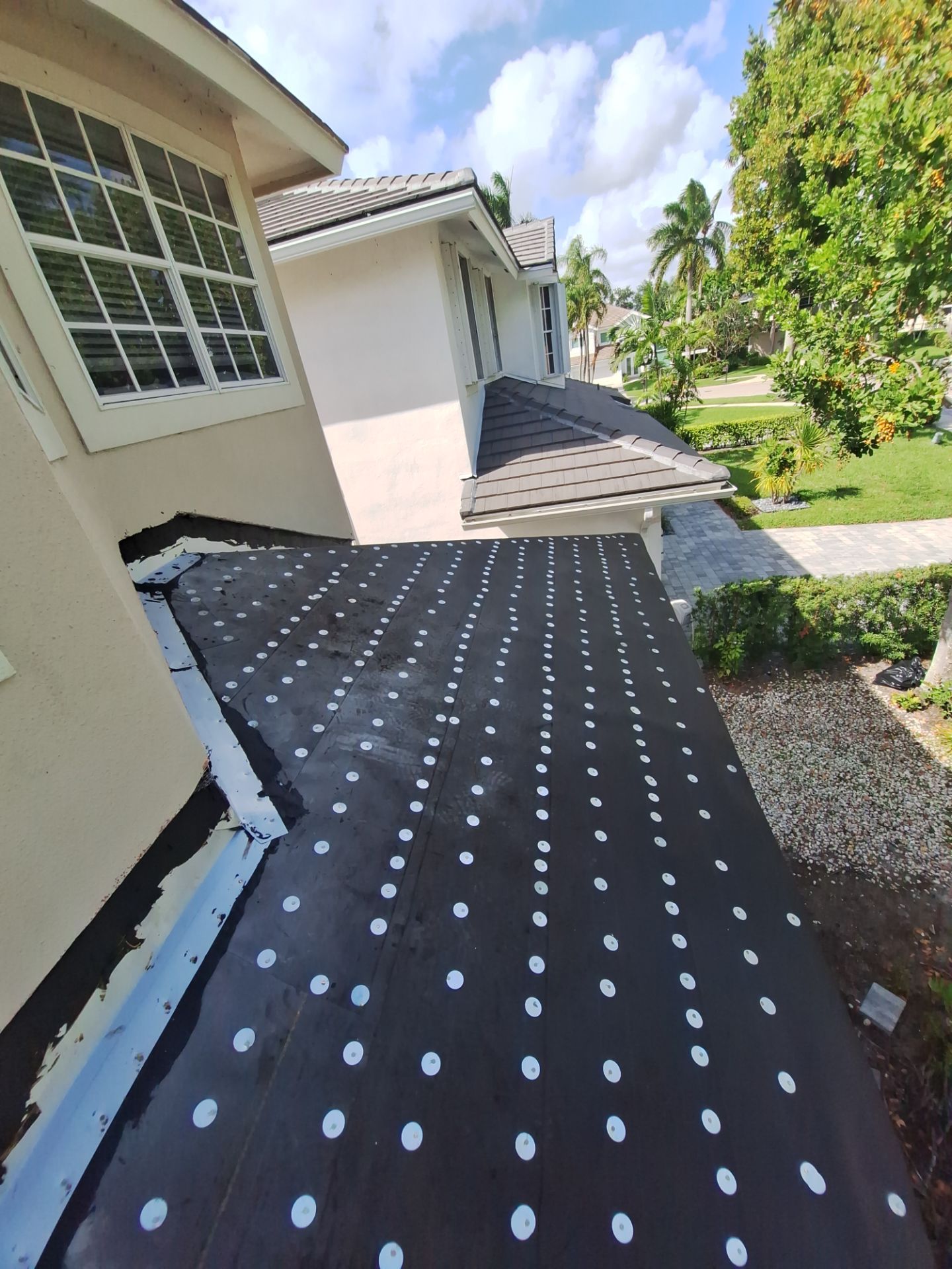 Residential Roofing Installation using 1" Nail strip metal roof by BLUES BROTHERS ROOFING