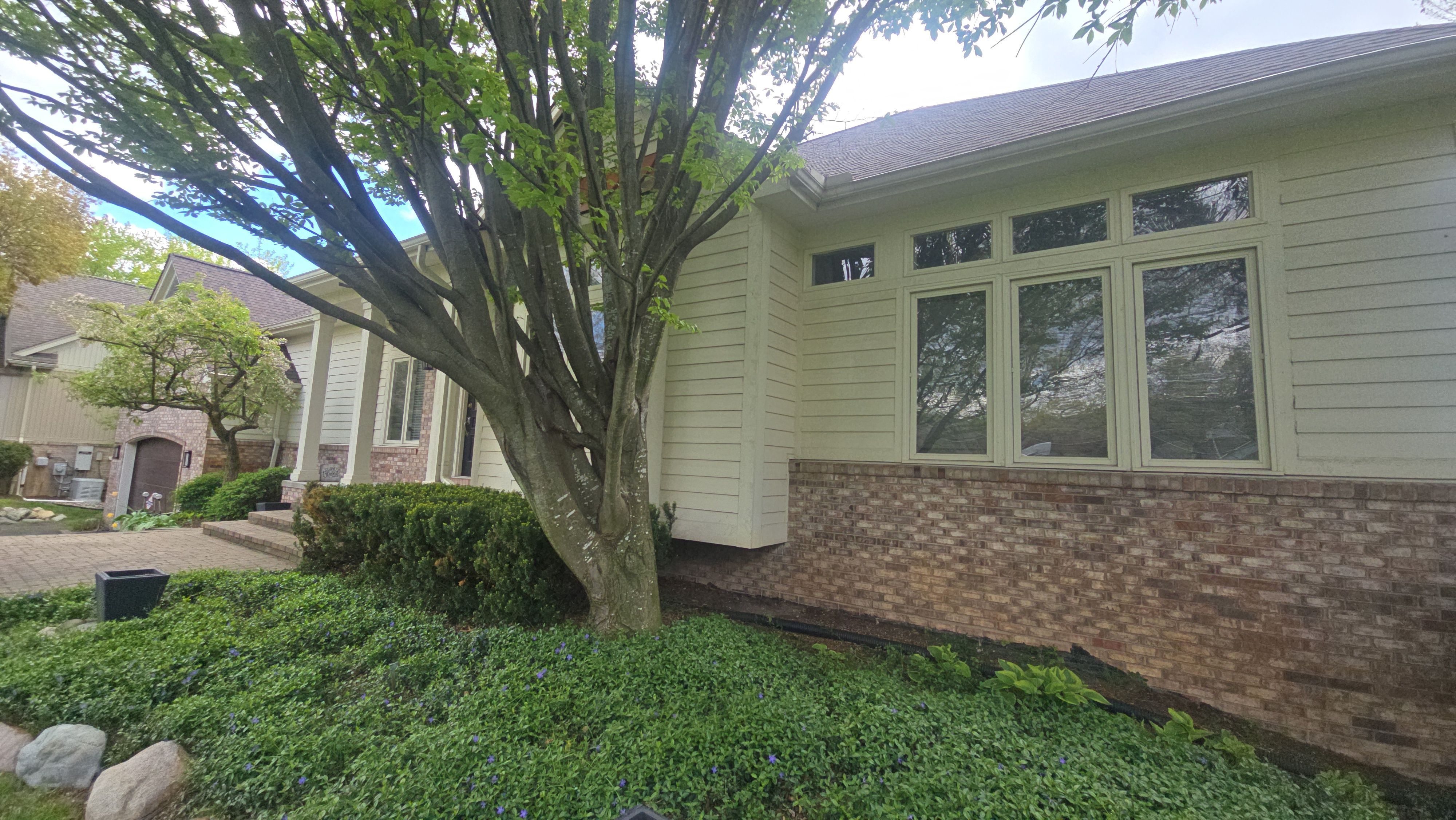 Exterior Wood Rot Repair and Trim Restoration in White Lake by Top Shelf Painter