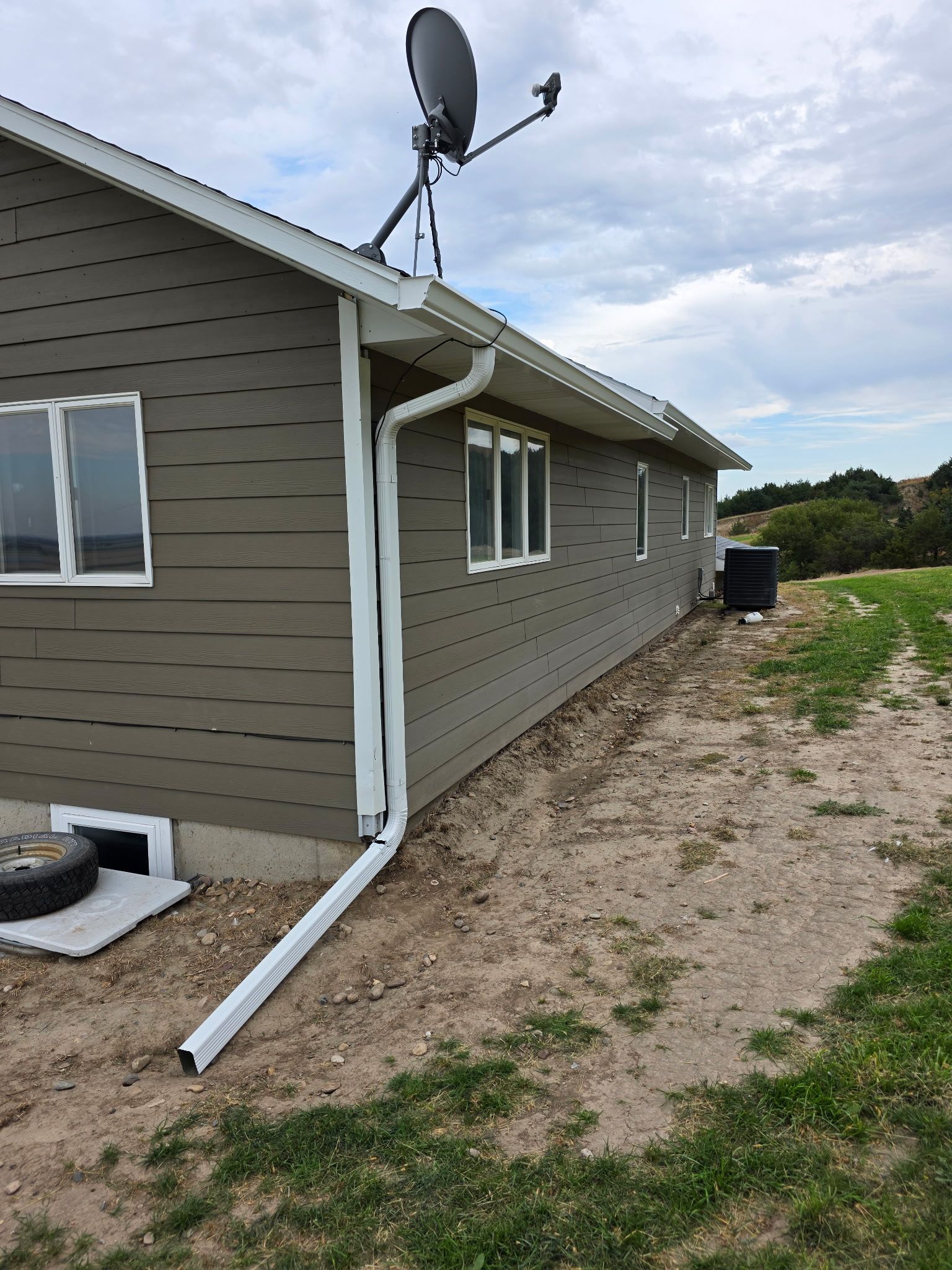 6" Seamless Gutters by Loyal Nine