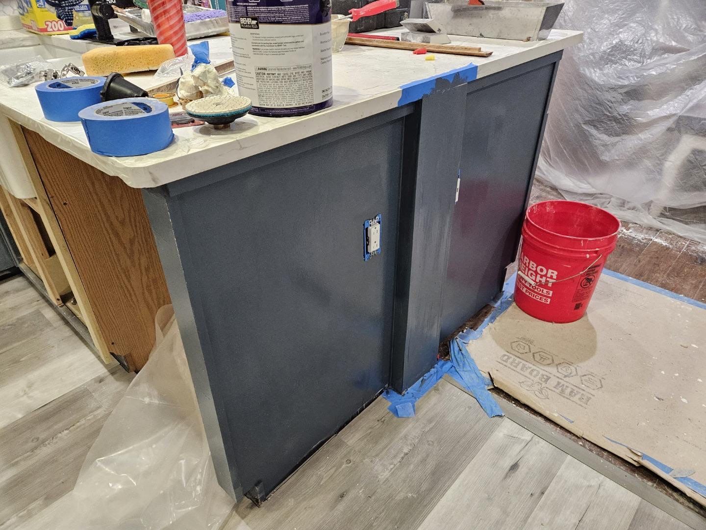 Modern Kitchen Remodel with Blue Cabinetry by Majesty Construction