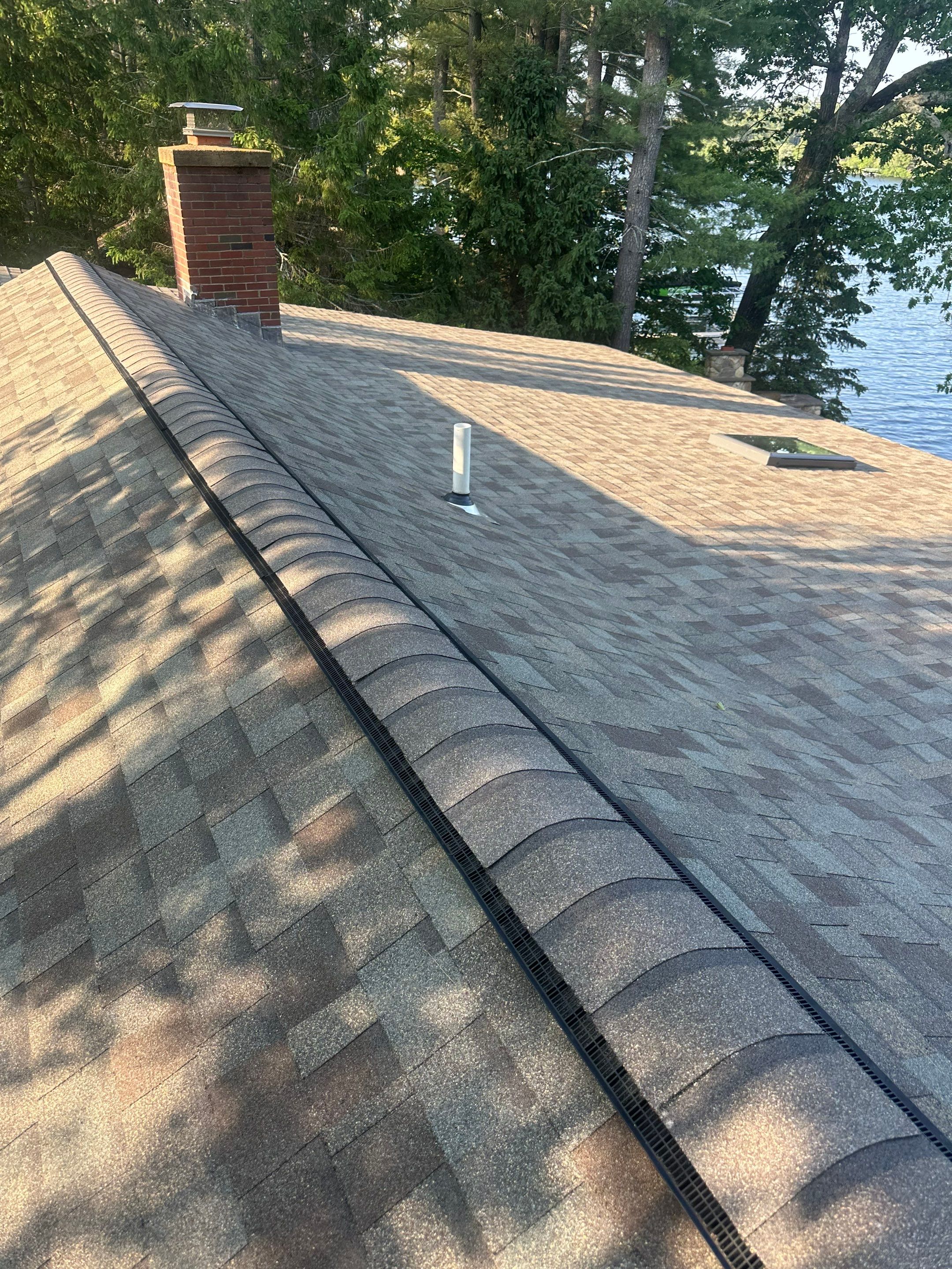 OC Roof Install On The Lake In Deerfield, New Hampshire by Tall pine roofing