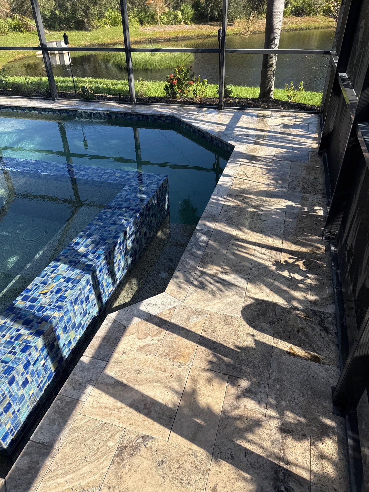 Travertine Pool Deck and Screen Enclosure Cleaning in Ellenton, FL | Oakleaf Hammock Community by Sunshine AquaWash