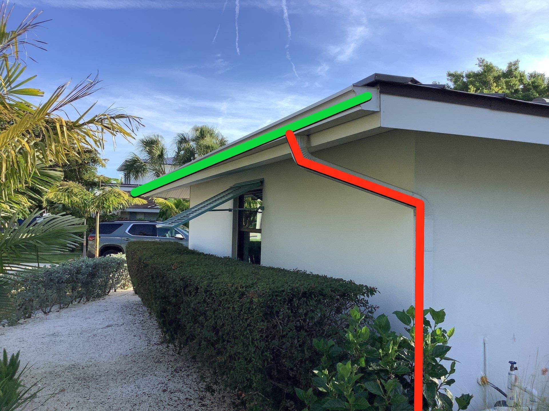 White Seamless Gutters and Downspouts in Sarasota FL by Gutter Professors
