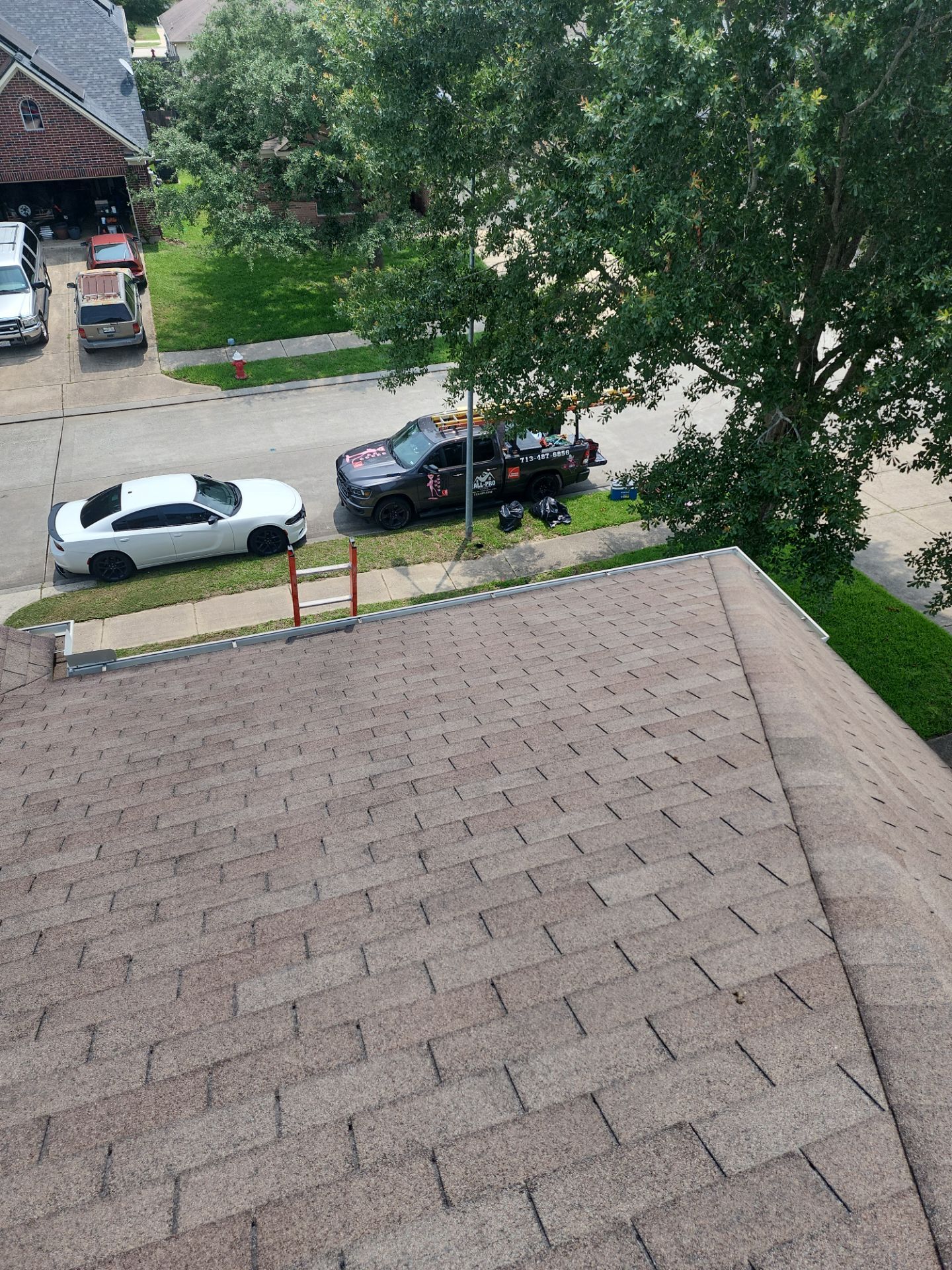 Hail Damage using Owen's Corning Duration (Lifetime) Shingles by Roof Repair Company