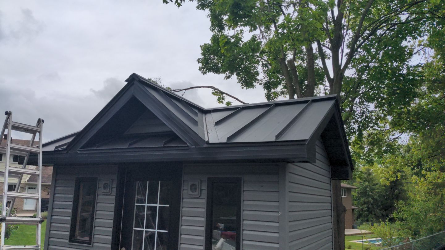 Residential Roofing Installation using 16" Standing Seam Panels by Jay Carter Roofing & Sheet Metal