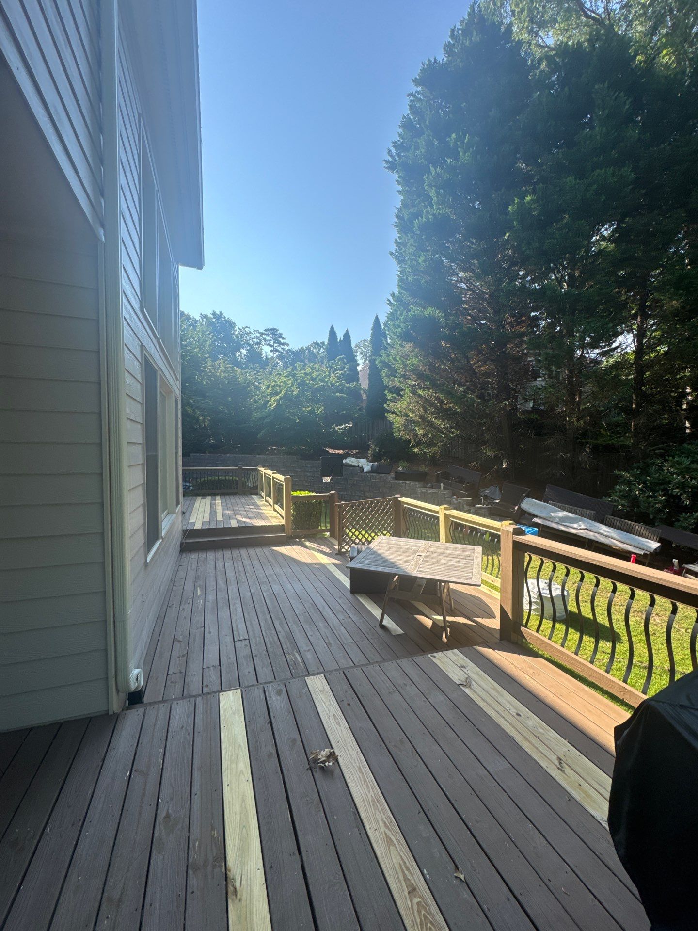 Elevated Covered Deck Construction and Porch Remodel in Mableton by Swift Home Renovations
