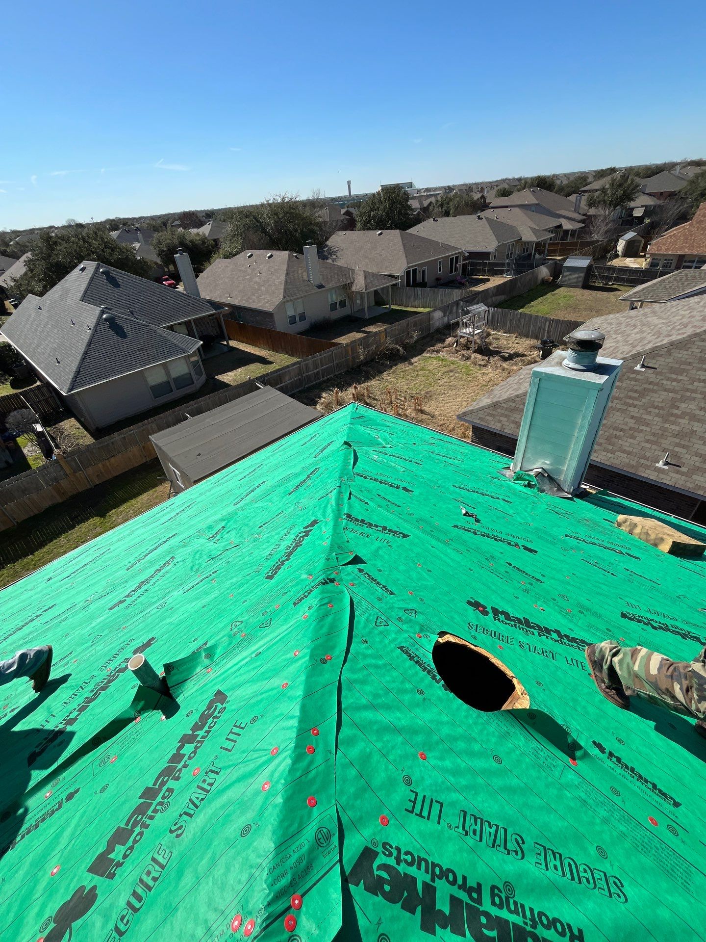 Reroof and Gutters by Berry Good Roofing 