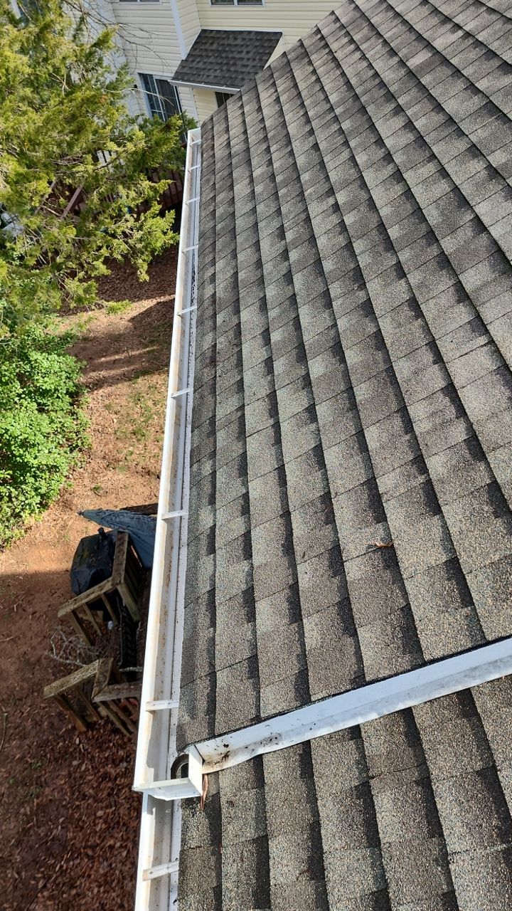 Gutter Cleaning using water by Power Wash Masters LLC
