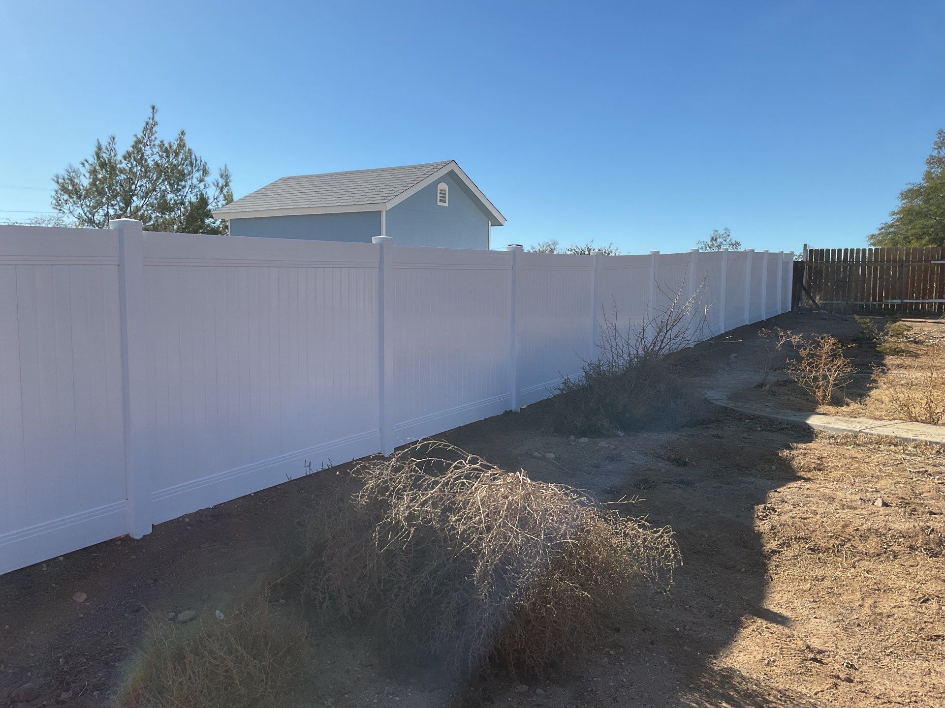 Fence Installation using vinyl and chain link  by Fence Guys Inc. 