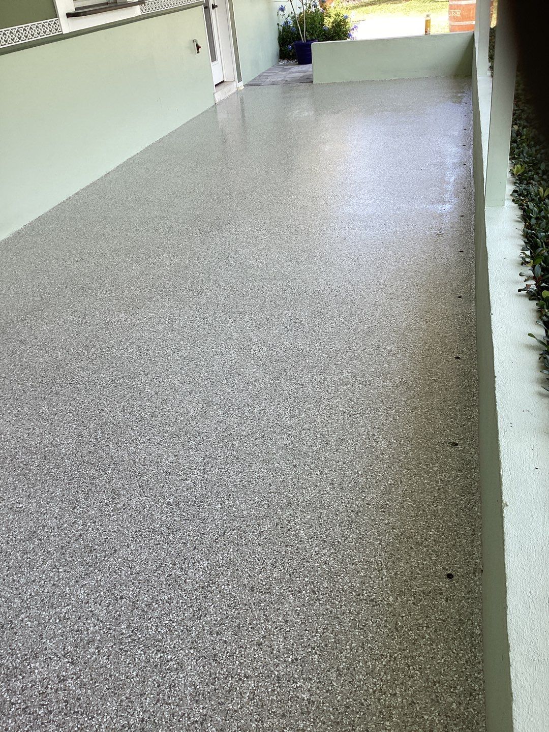 Patio using Mt Everest by Amvet concrete coatings llc