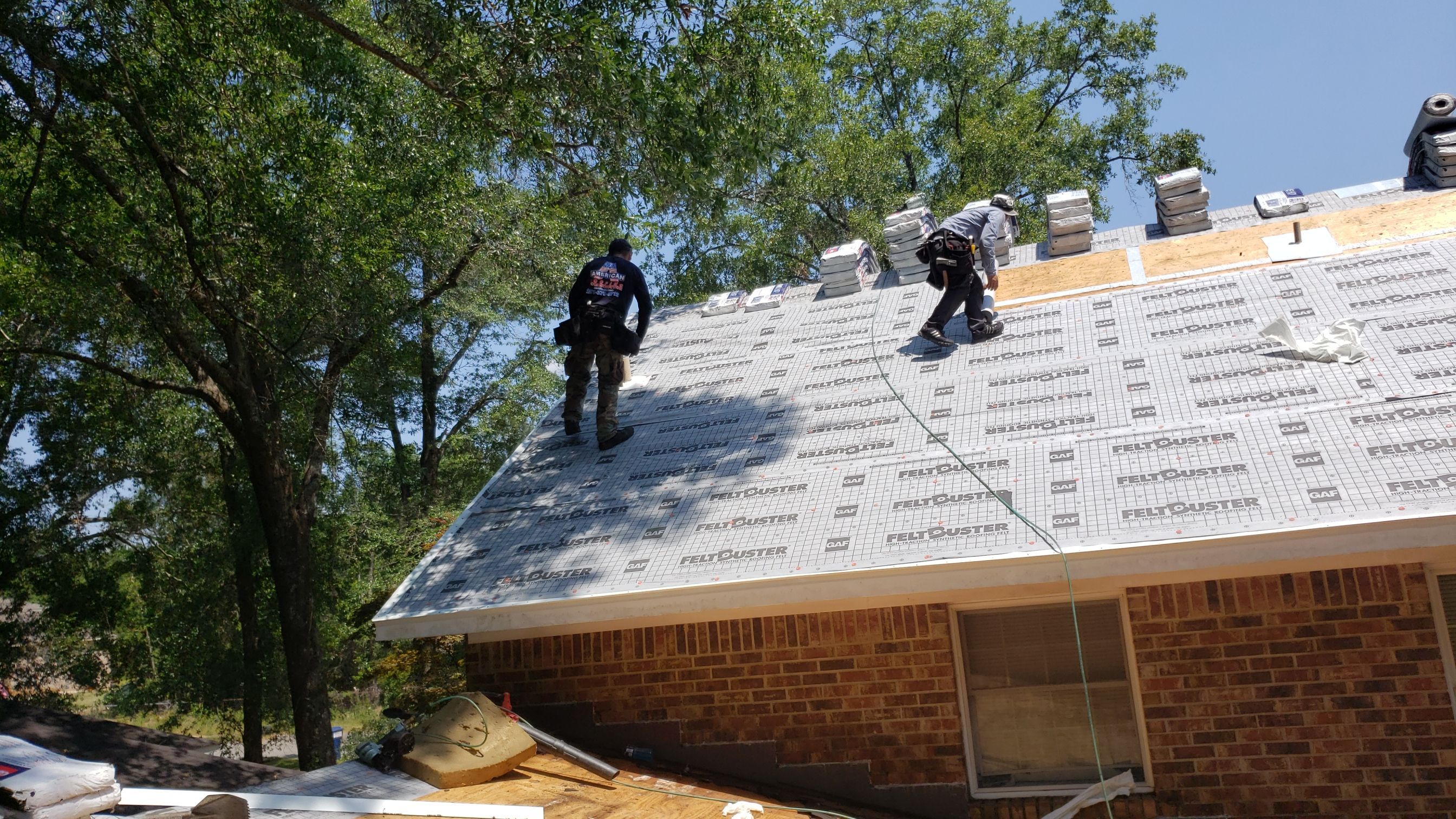 Residential Roofing Installation using Roof Replacement by American Roofing & Construction LLC