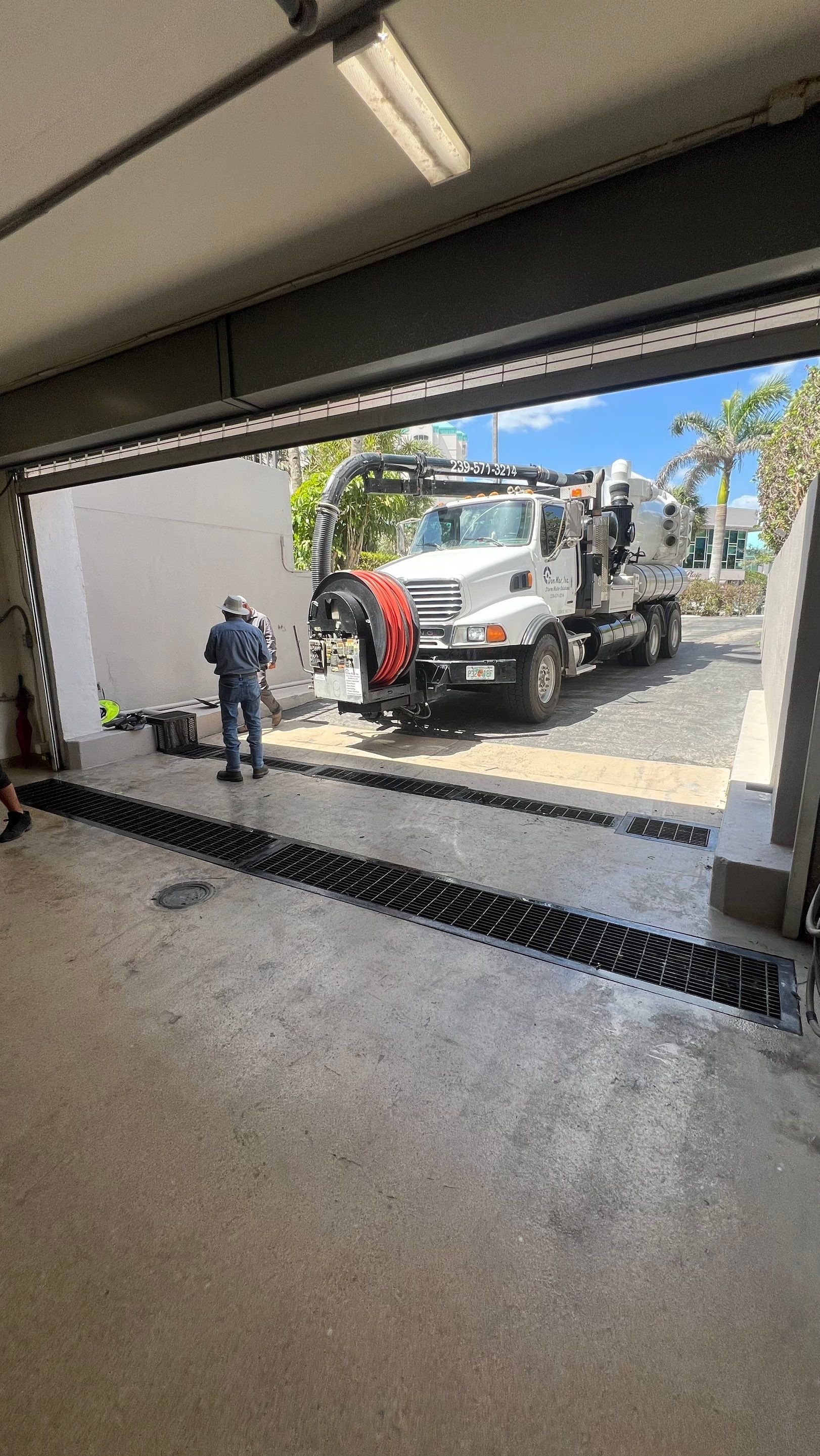 Condo Channel Drain and Sump Pit Cleaning by APS Power & Water