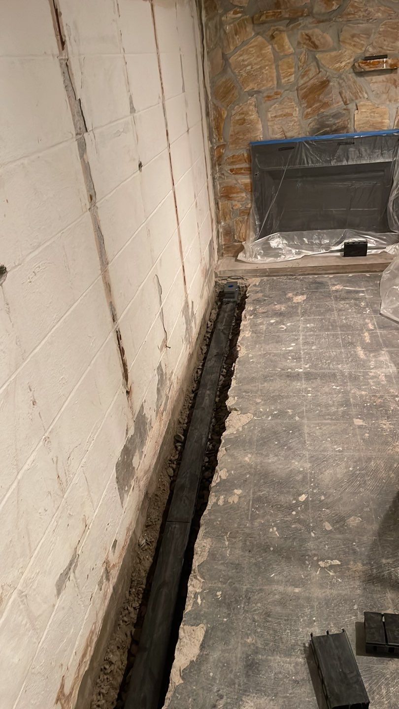 Embedded Fiber Reinforcement and Basement Waterproofing using GrateDrain Waterproofing System by Toledo Basement Repair
