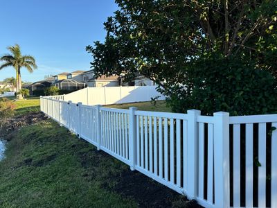 Vinyl Picket Fence Installation using 6Ft White Vinyl Privacy Fence with a 4Ft White Clearwater Picket Fence