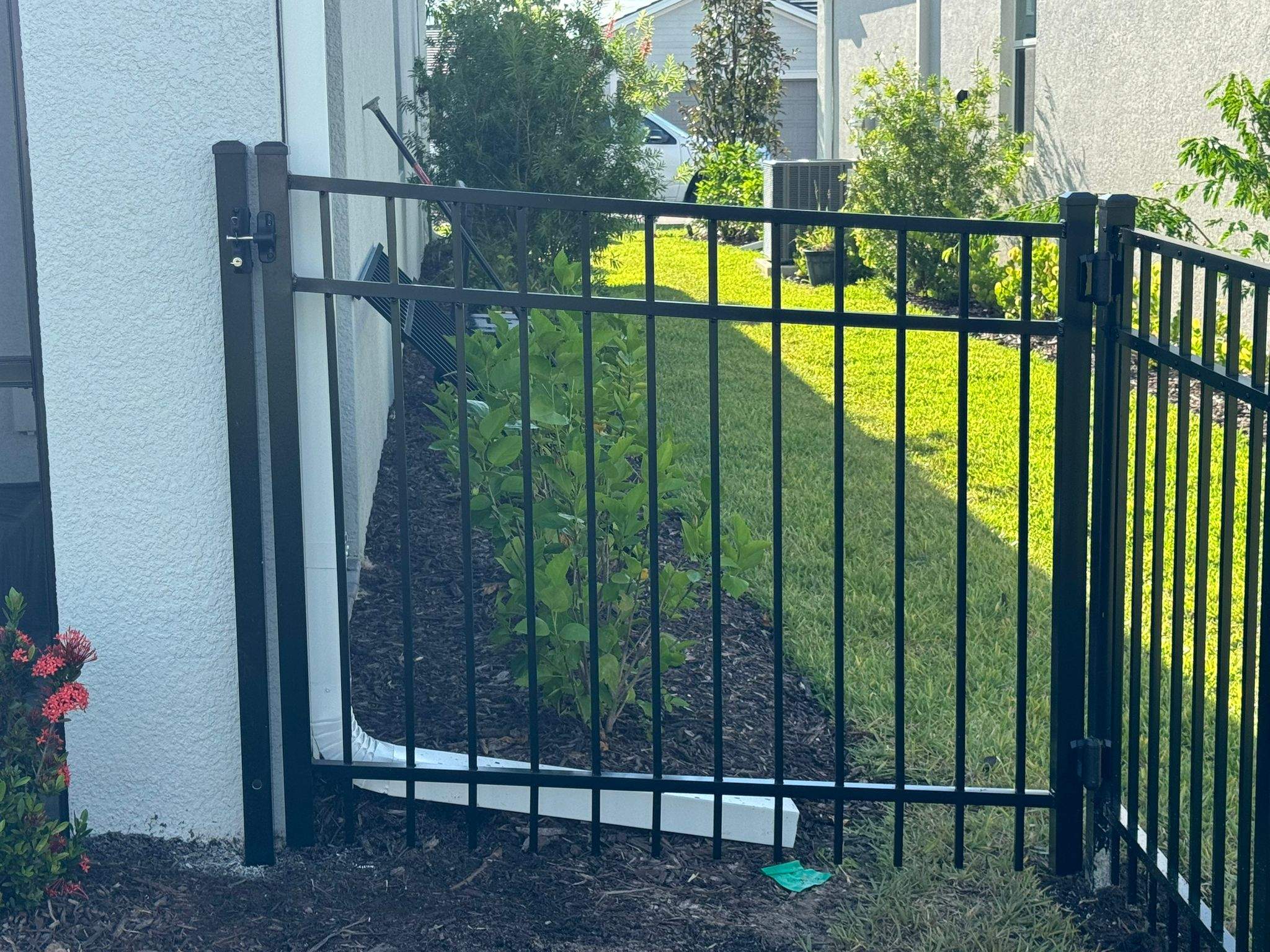 Black Aluminum Picket Fence Installation in Venice, Florida by True Fence LLC