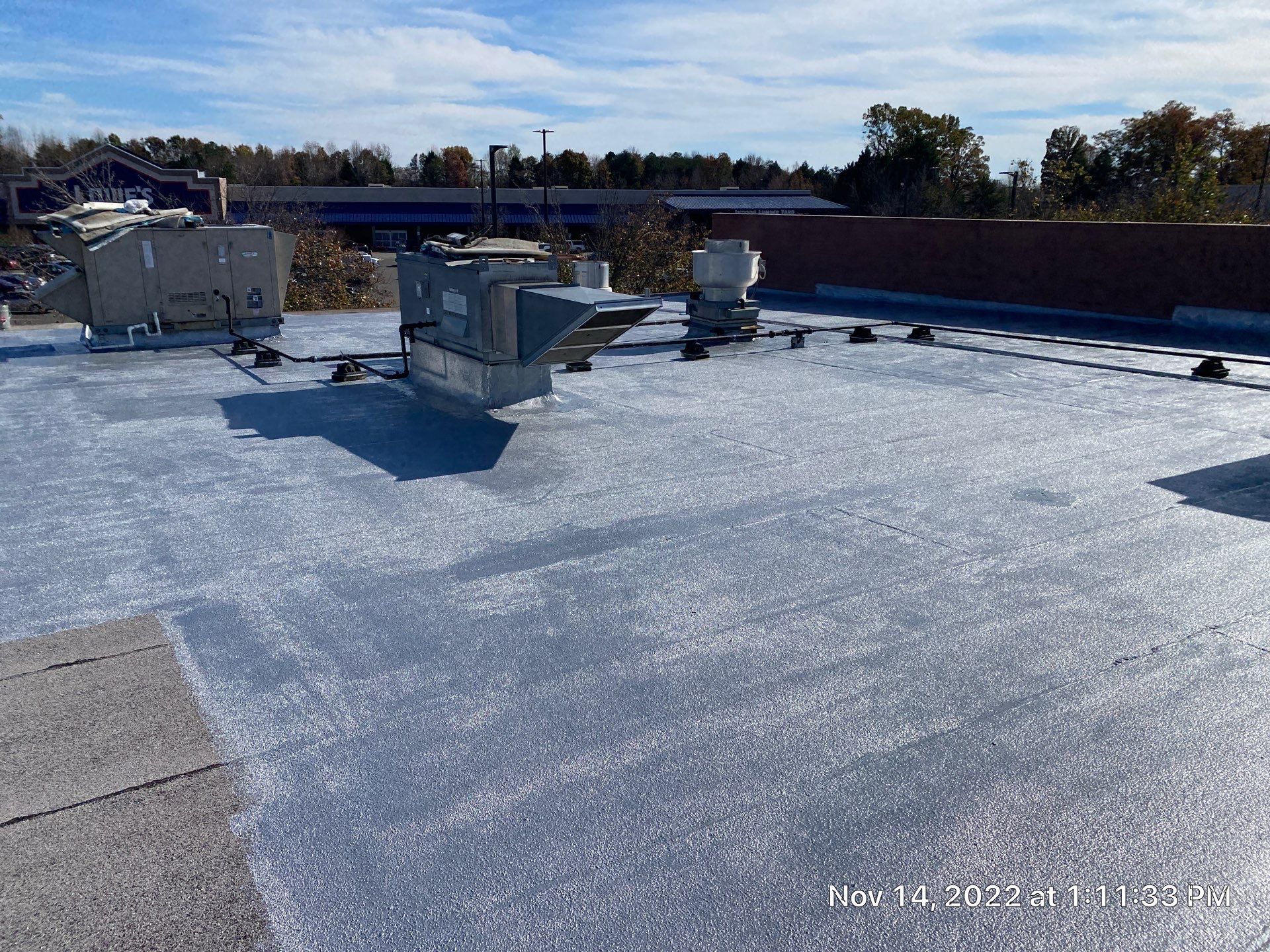 Commercial Coating using Poly Urerthane and Silicone Coating by Just In Time Roofing and Restoration