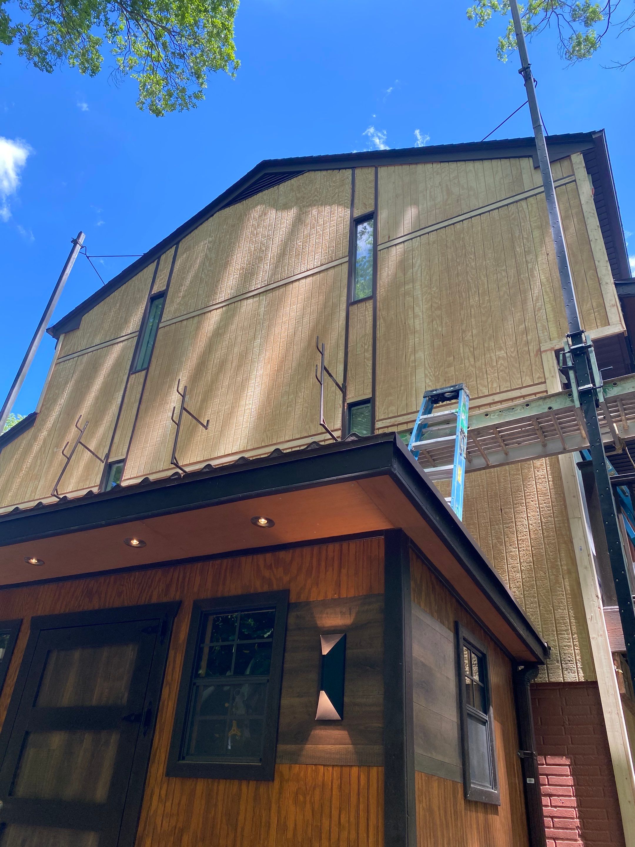 Woodbridge: T1-11 Pywood Panel Siding Installation by RM Banning, Inc.