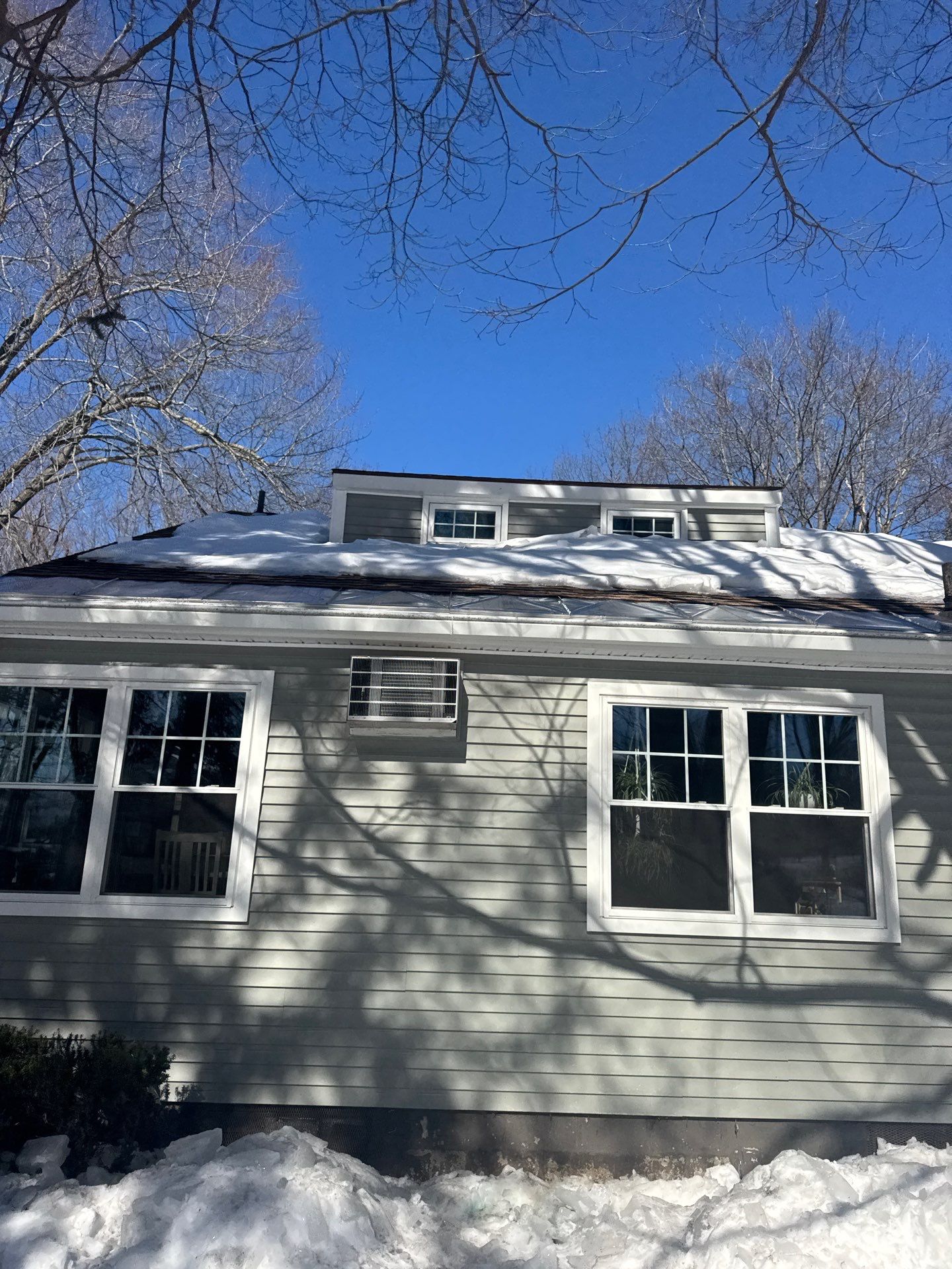 Snow/Ice Belt & Ice Dam Removal Project in Woburn by Mighty Dog Roofing of Greater Middlesex County