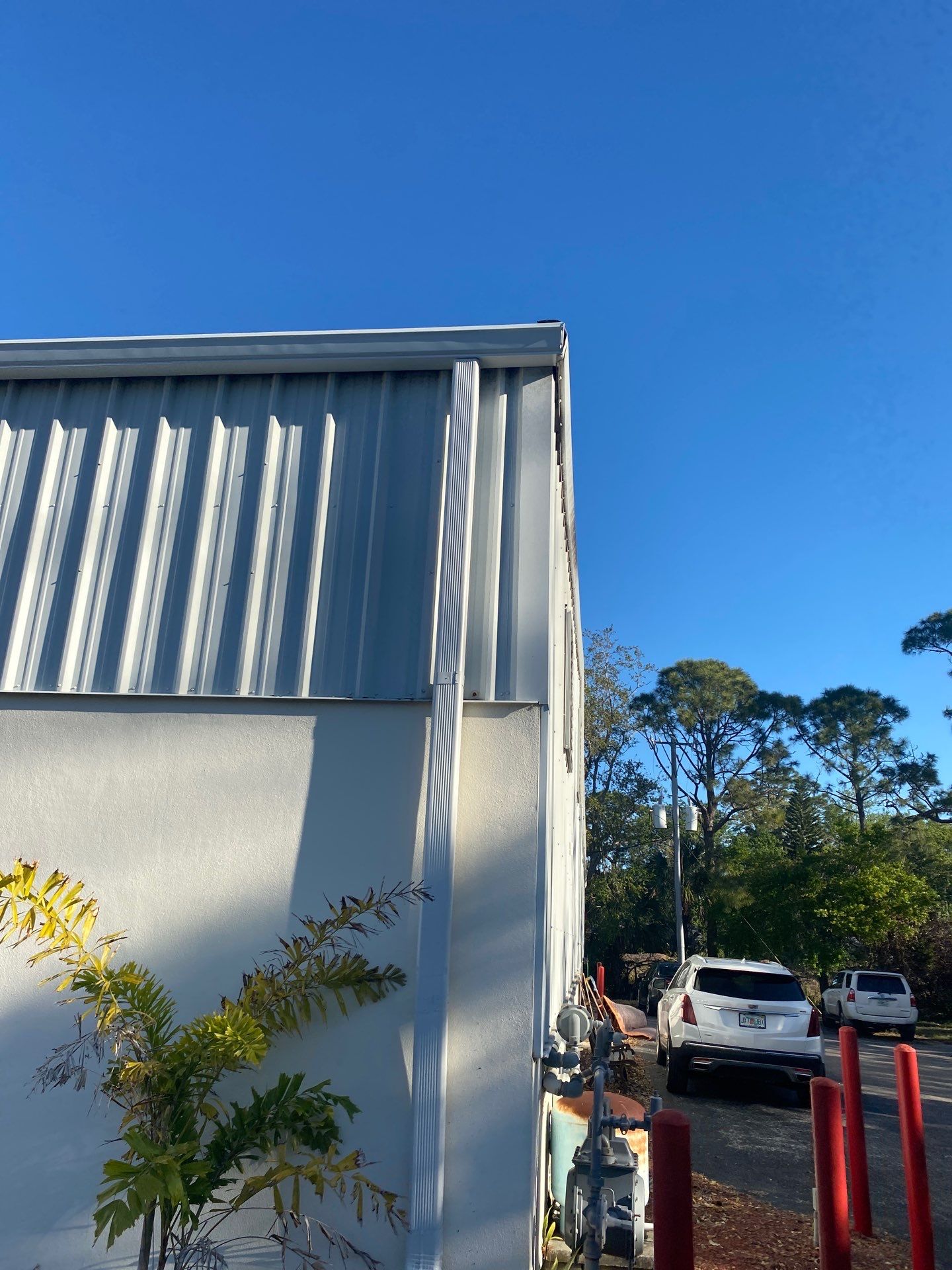 White 6-Inch Gutters with Downspouts in Bradenton FL by Gutter Professors