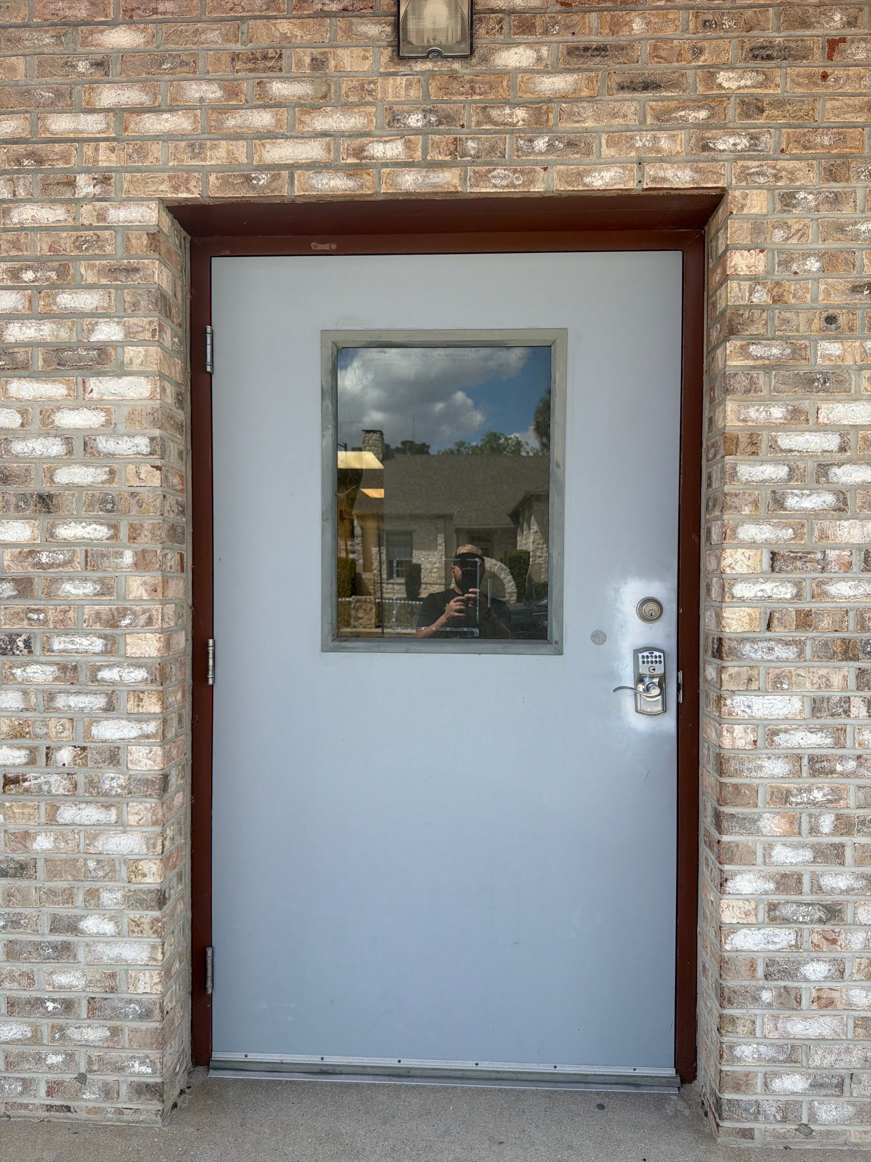 Commercial Entry Door Upgrade with ProVia Sidelight in Newberry by Windows & Doors Store