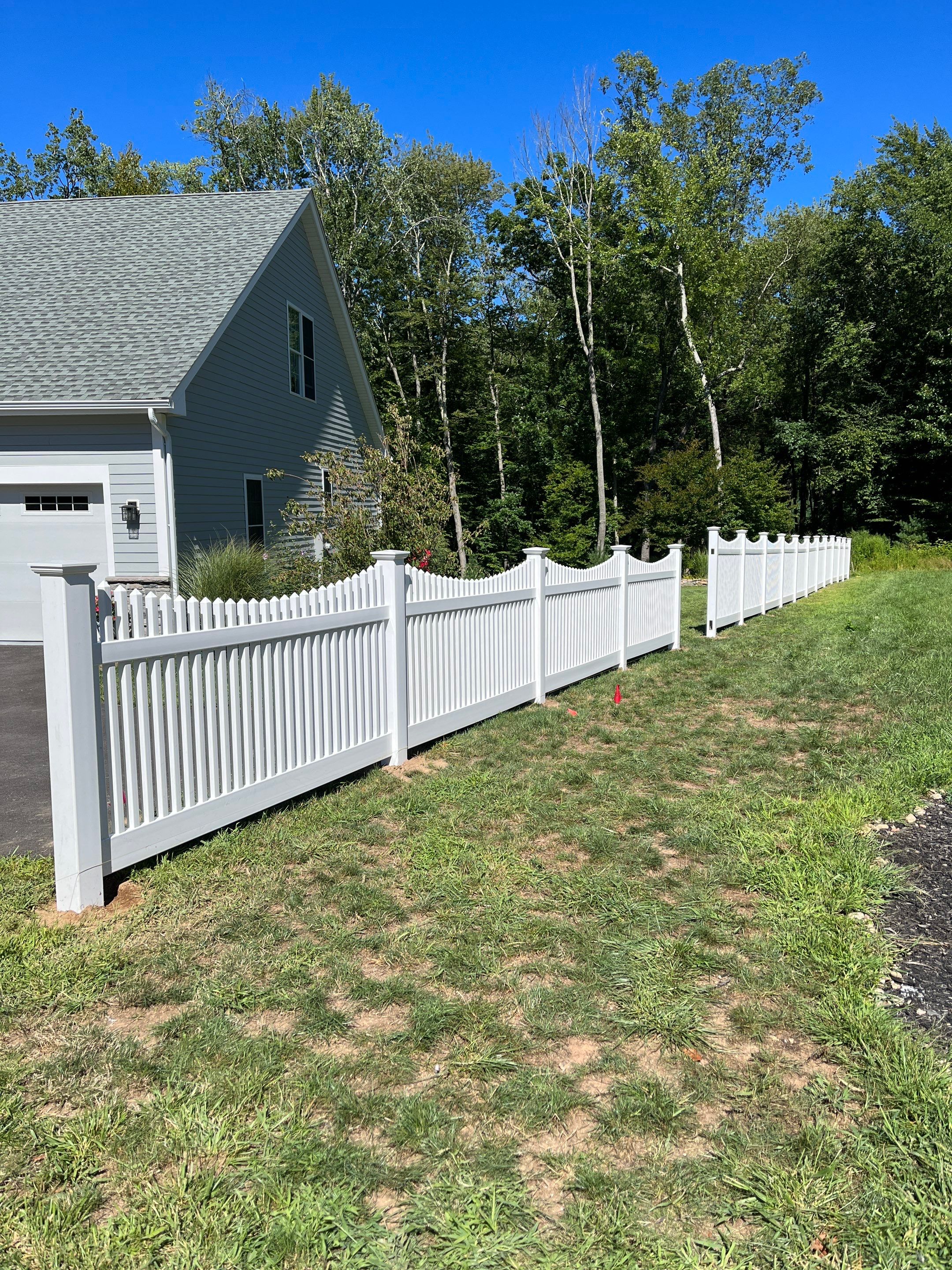 New Vinyl picket fence in white by DiGiorgi Roofing and Siding Inc