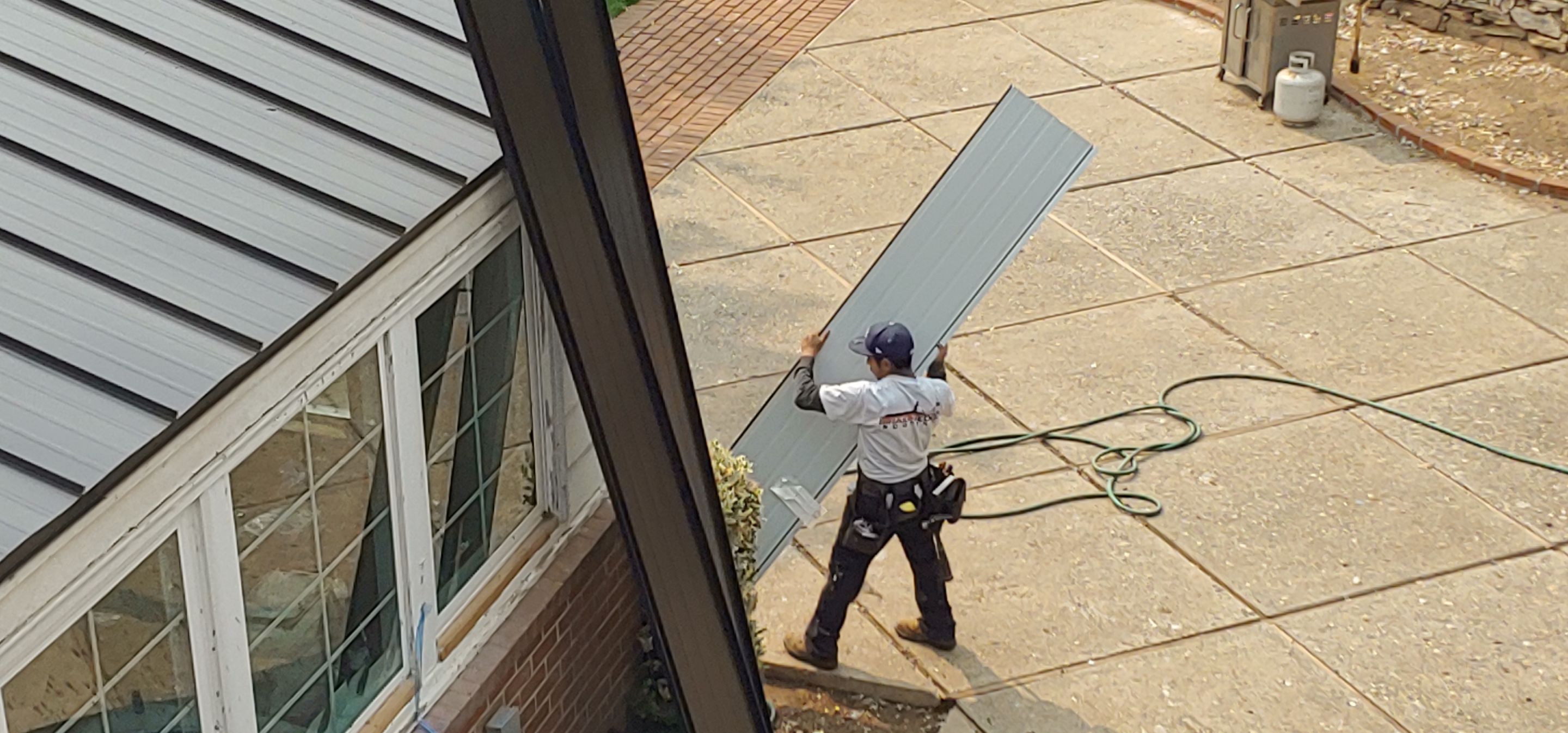 Residential Roofing Installation using Standing seam metal roofing system by Straight Edge Roofing Inc