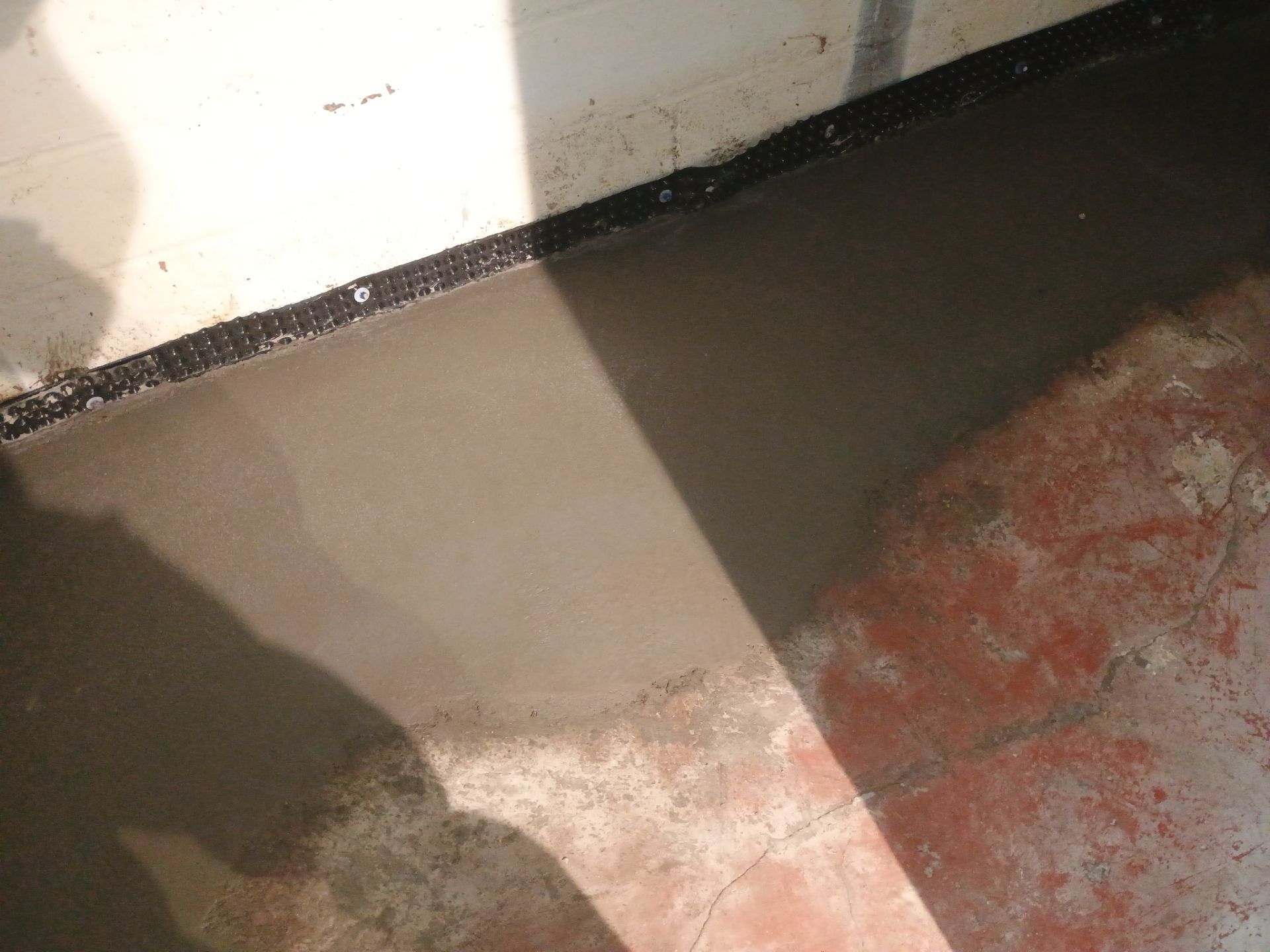 Interior Drain Tile & Sump Pump System in North Minneapolis by Waterproofing Northeast