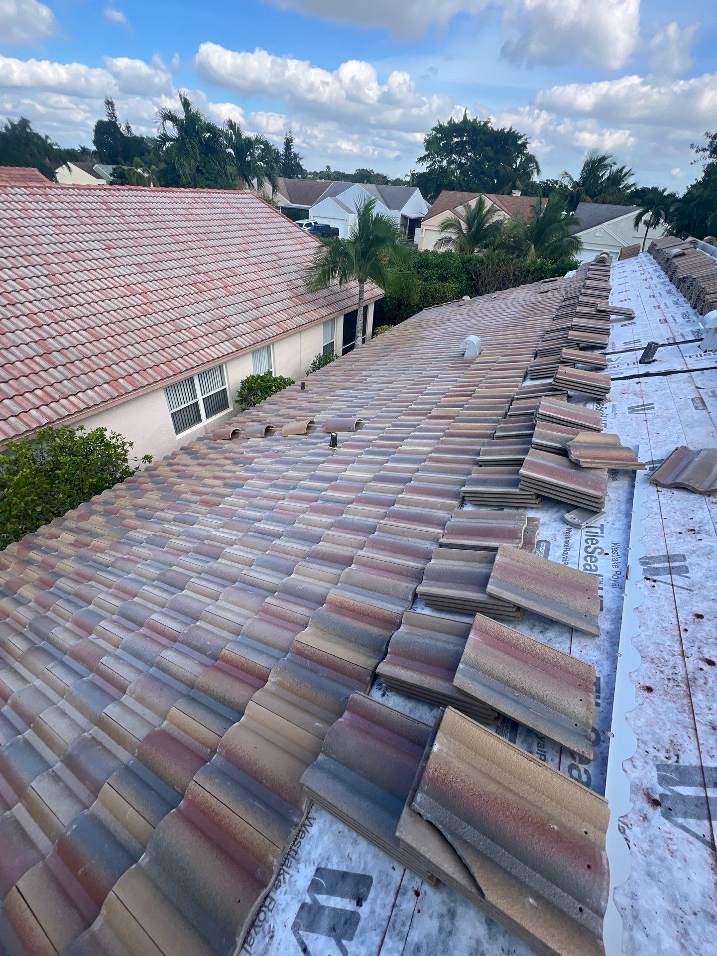 Concrete Tile Roof Replacement and Wood Decking Repair in Boca Raton by Aastro Roofing