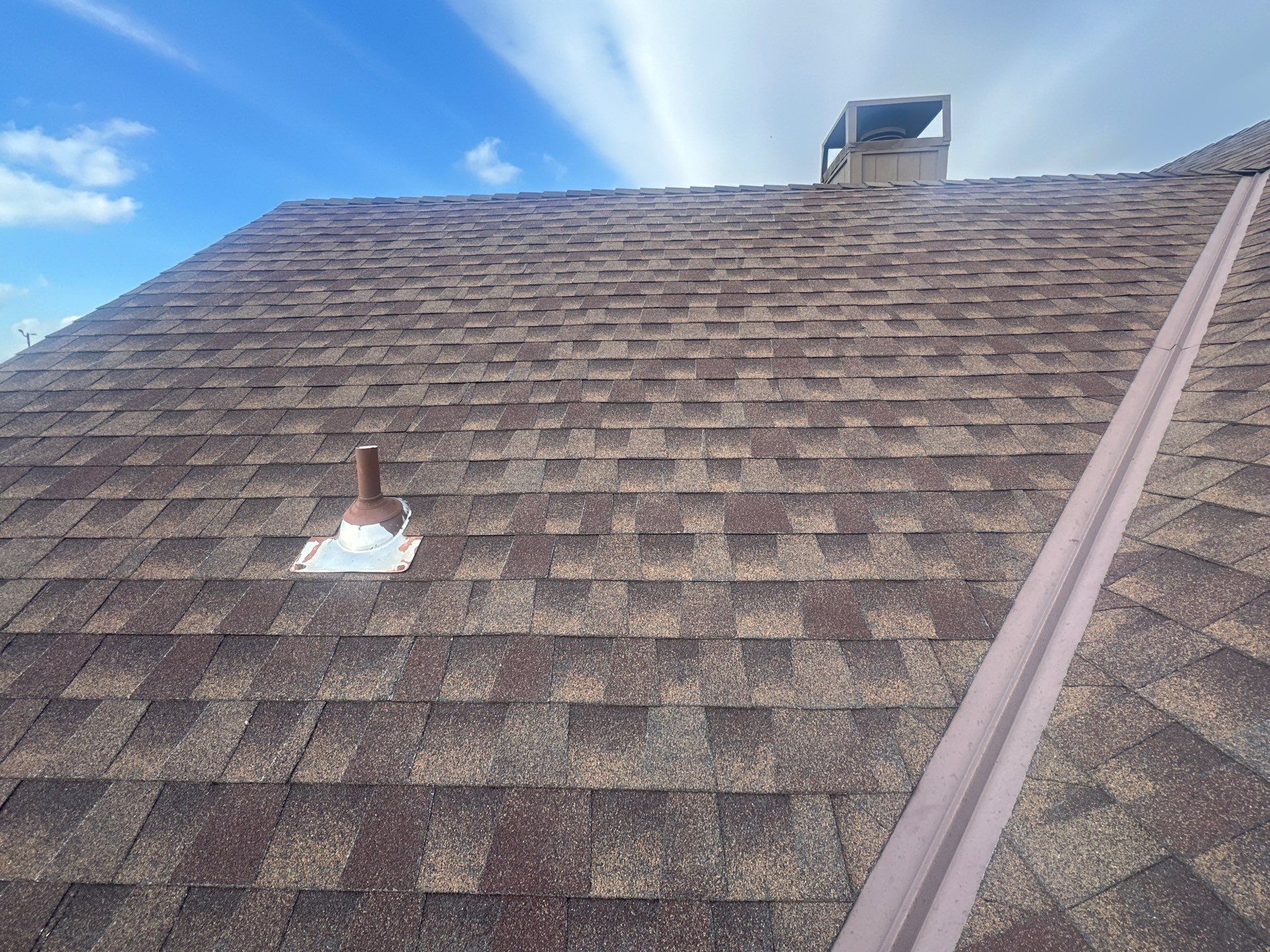 Hail Damage Roof Inspection in Oklahoma City, OK by McCann's Roofing and Construction