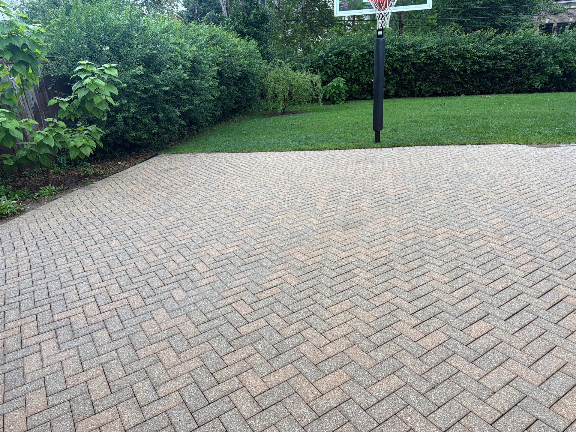 Brick paver repair, cleaning and sealing by Northern Power Washing LLC.