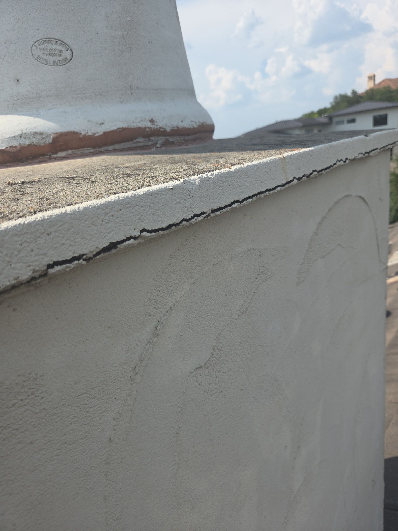 Tile roof and custom chimney cap by REPS Austin Area Roofer