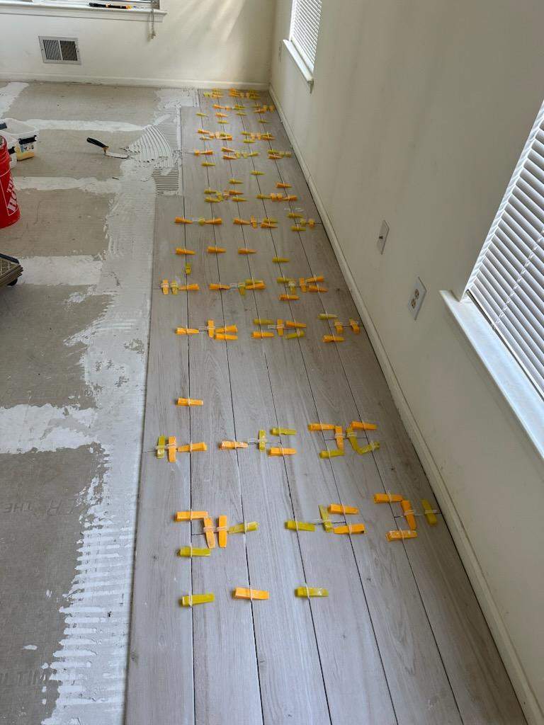 Plank Tile installation using Large Format Porceline Tile by Footprints Floors Morristown