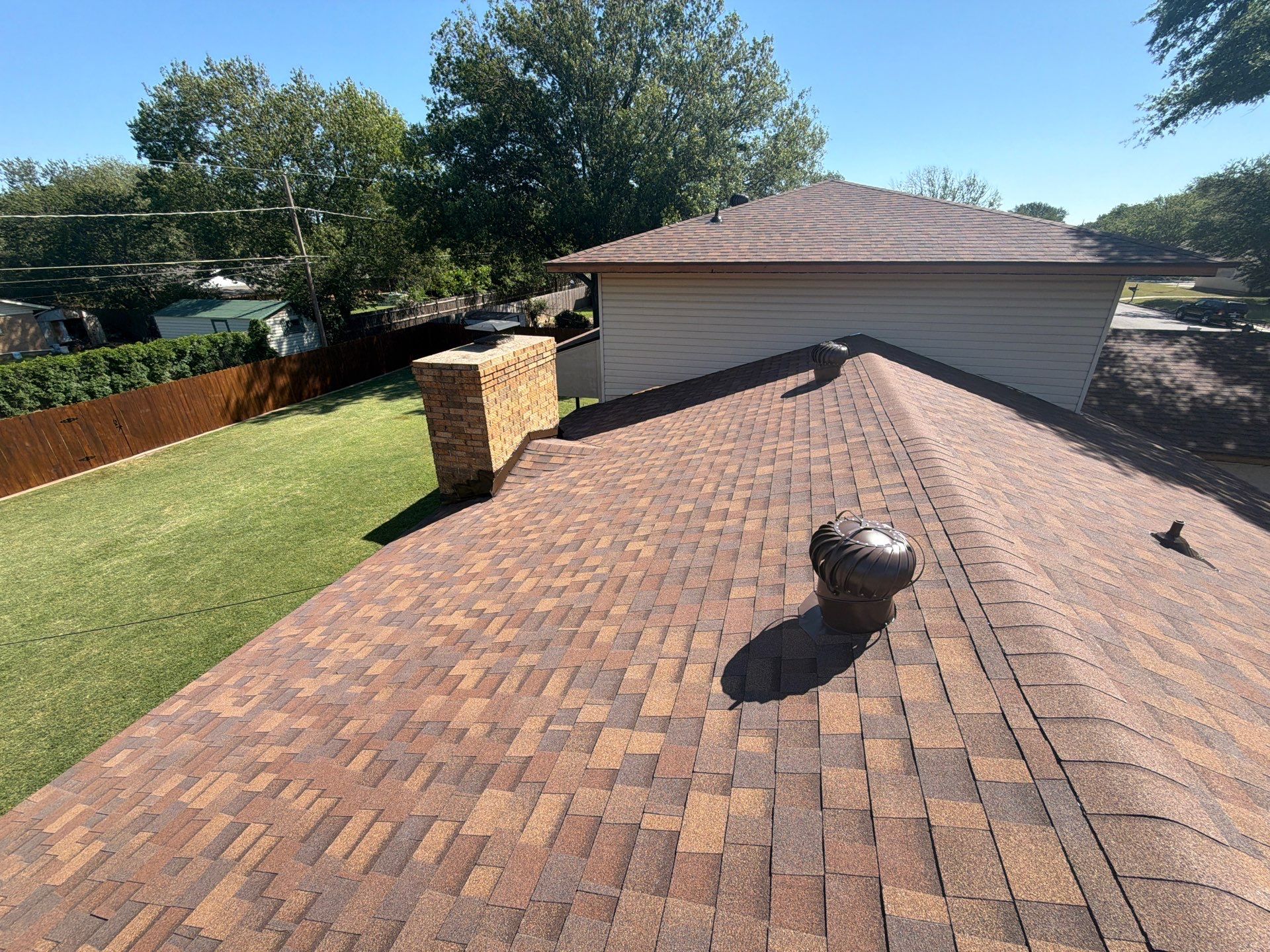 Full Roof Replacement and Privacy Fence Installation in Burkburnett by Shearman Roofing & Construction
