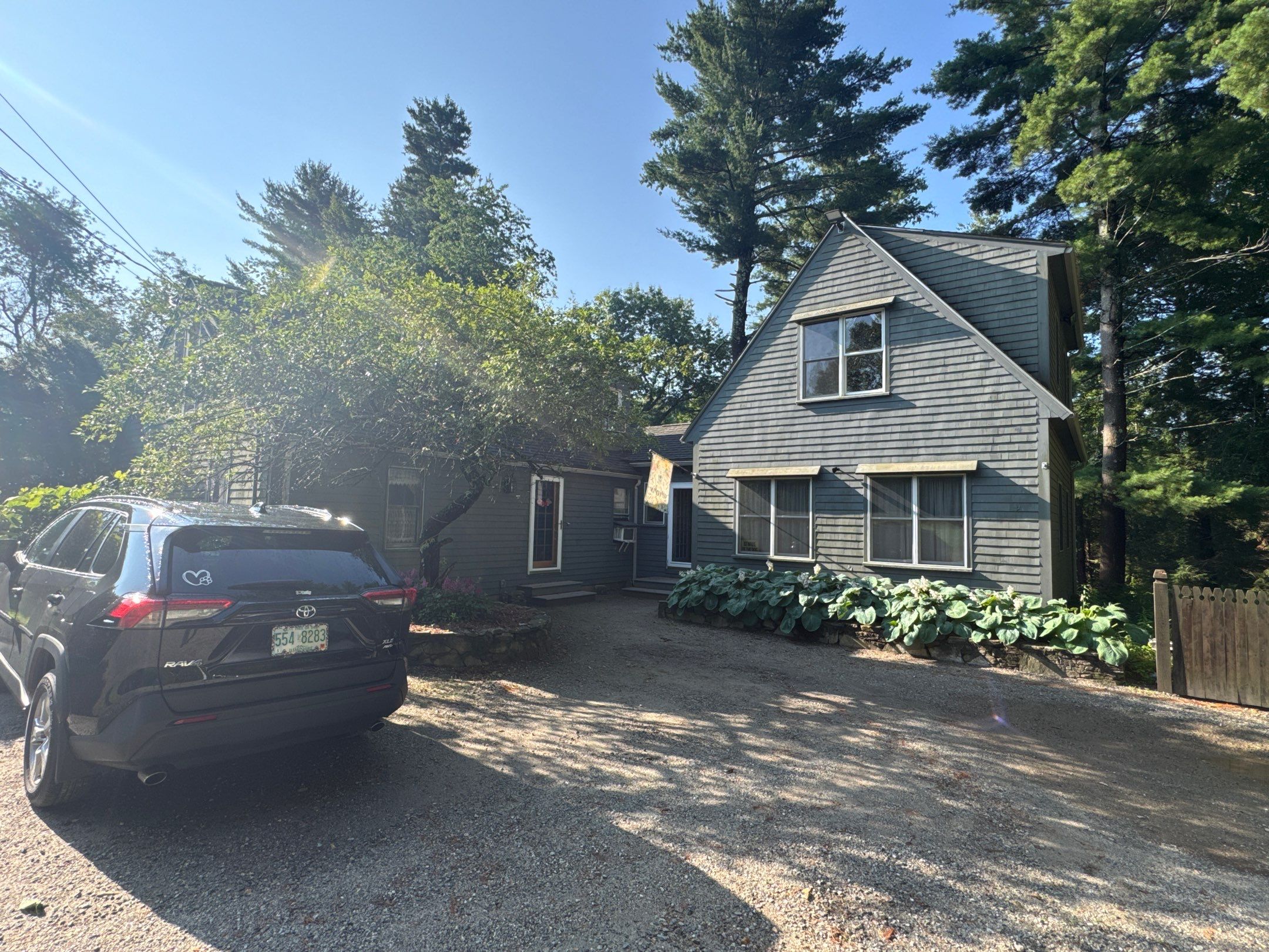 Roof Replacement & Dead Valley Repair in Kensington, NH | GAF Timberline Weathered Wood by Compass exteriors
