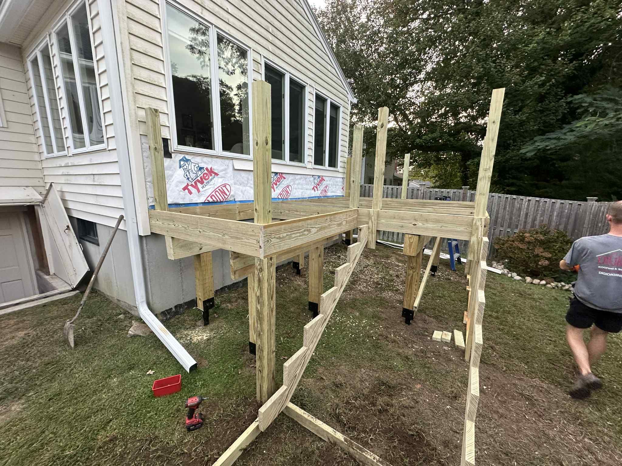 New Deck With Lattice enclosed bottom, Trex Lineage Carmel, Transcend cocktail rail.  by DiGiorgi Roofing and Siding Inc