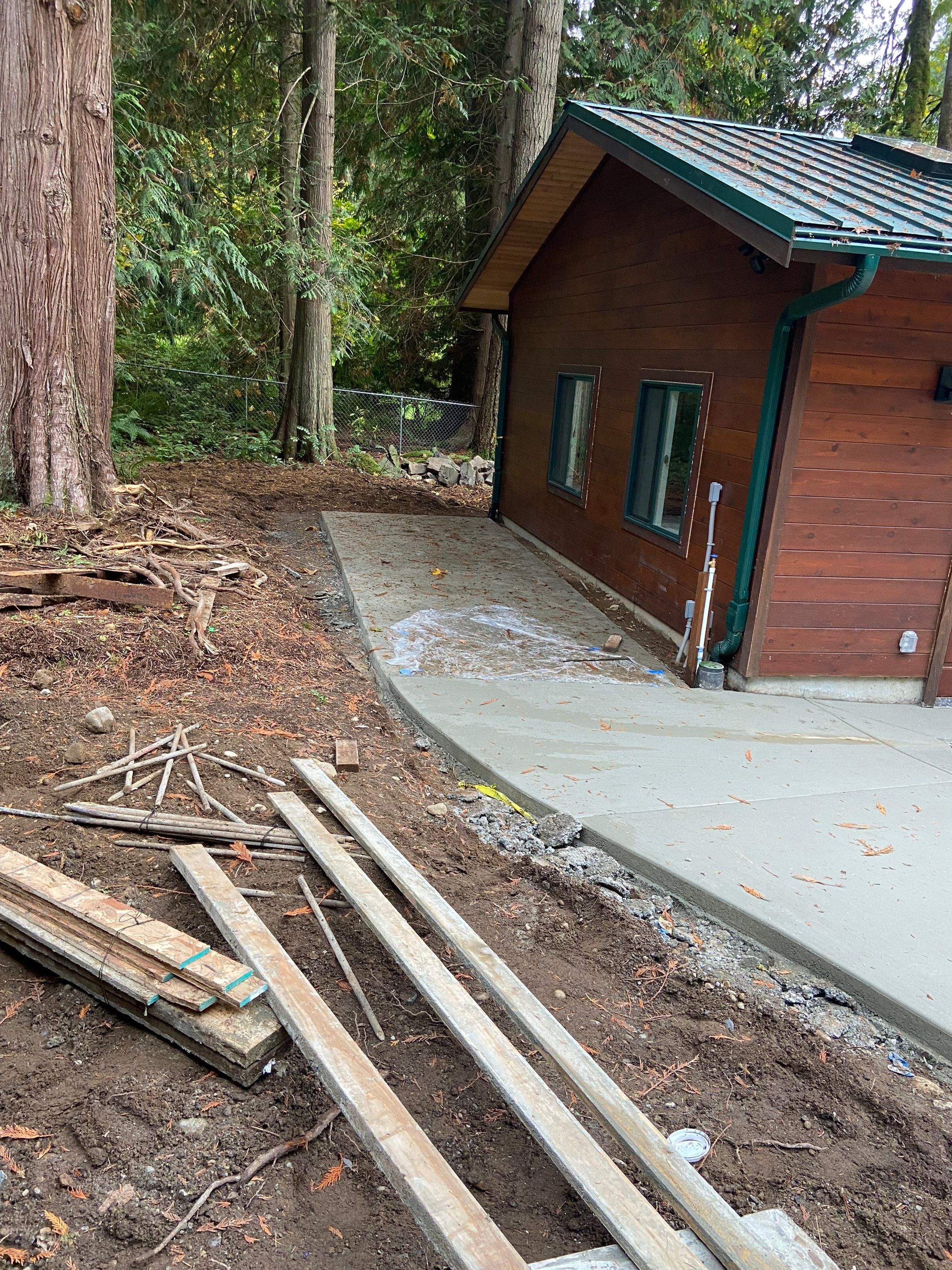 Pia | Custom Concrete Driveway, Walkway & Floating Steps by Jireh Asphalt & Concrete Inc 