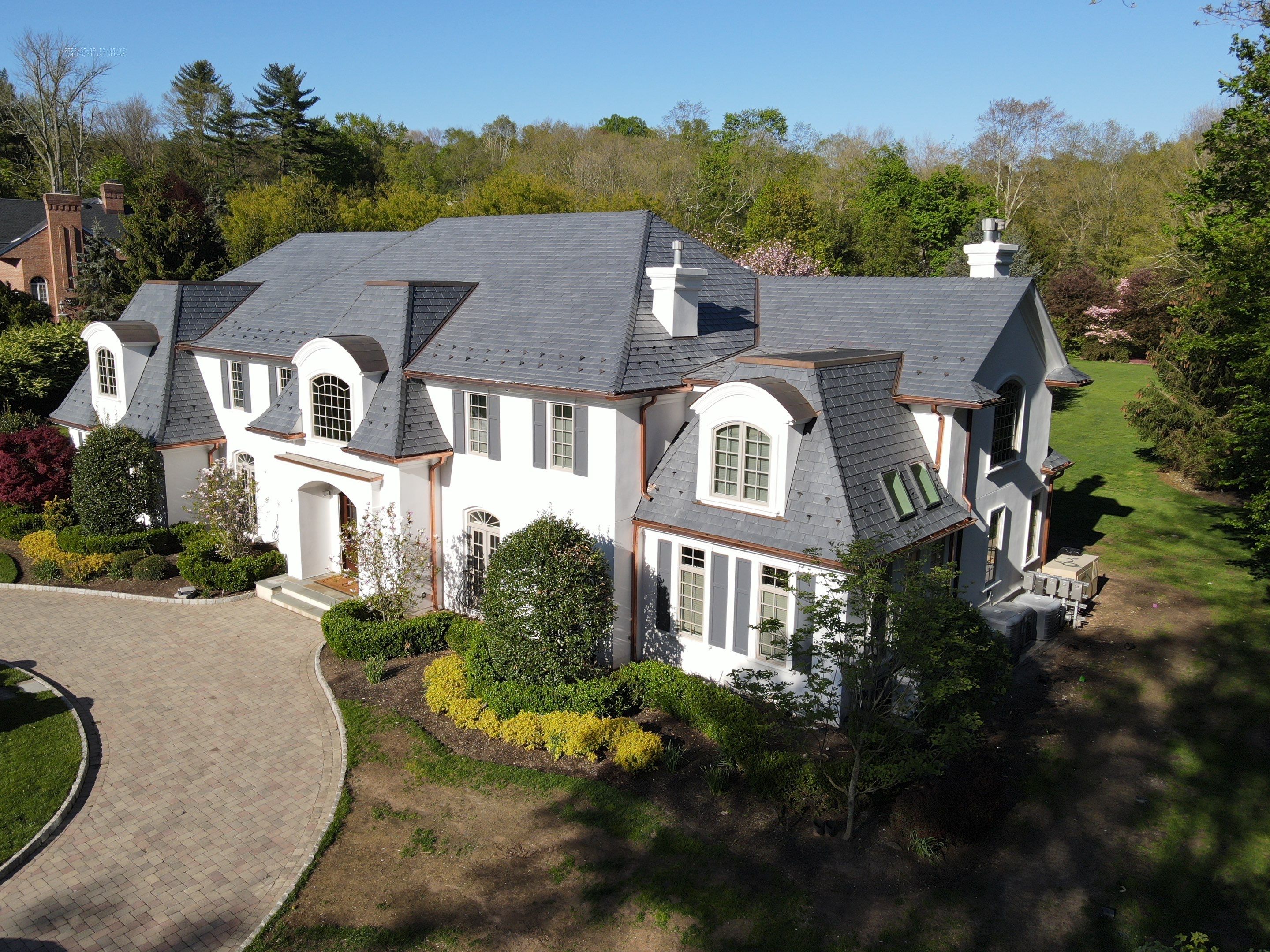 Full Slate - Stucco - Copper Remodel by USA Roof Masters