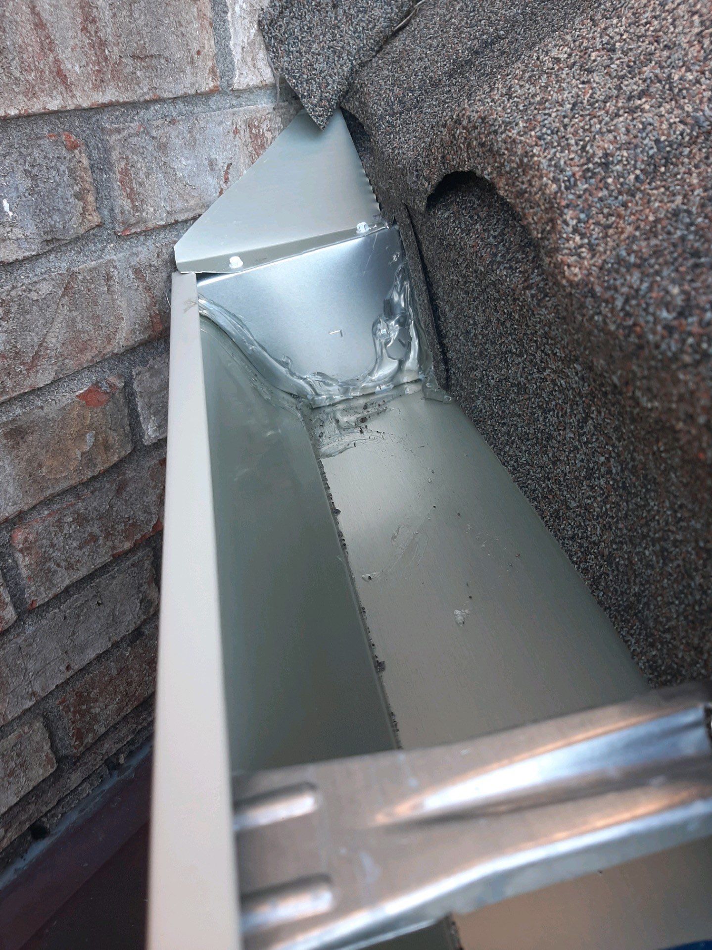 Seamless Gutter Installation with Wicker Color K-Style Gutters and LeafBlaster Pro Mesh Gutter Guards by Gutter Professors