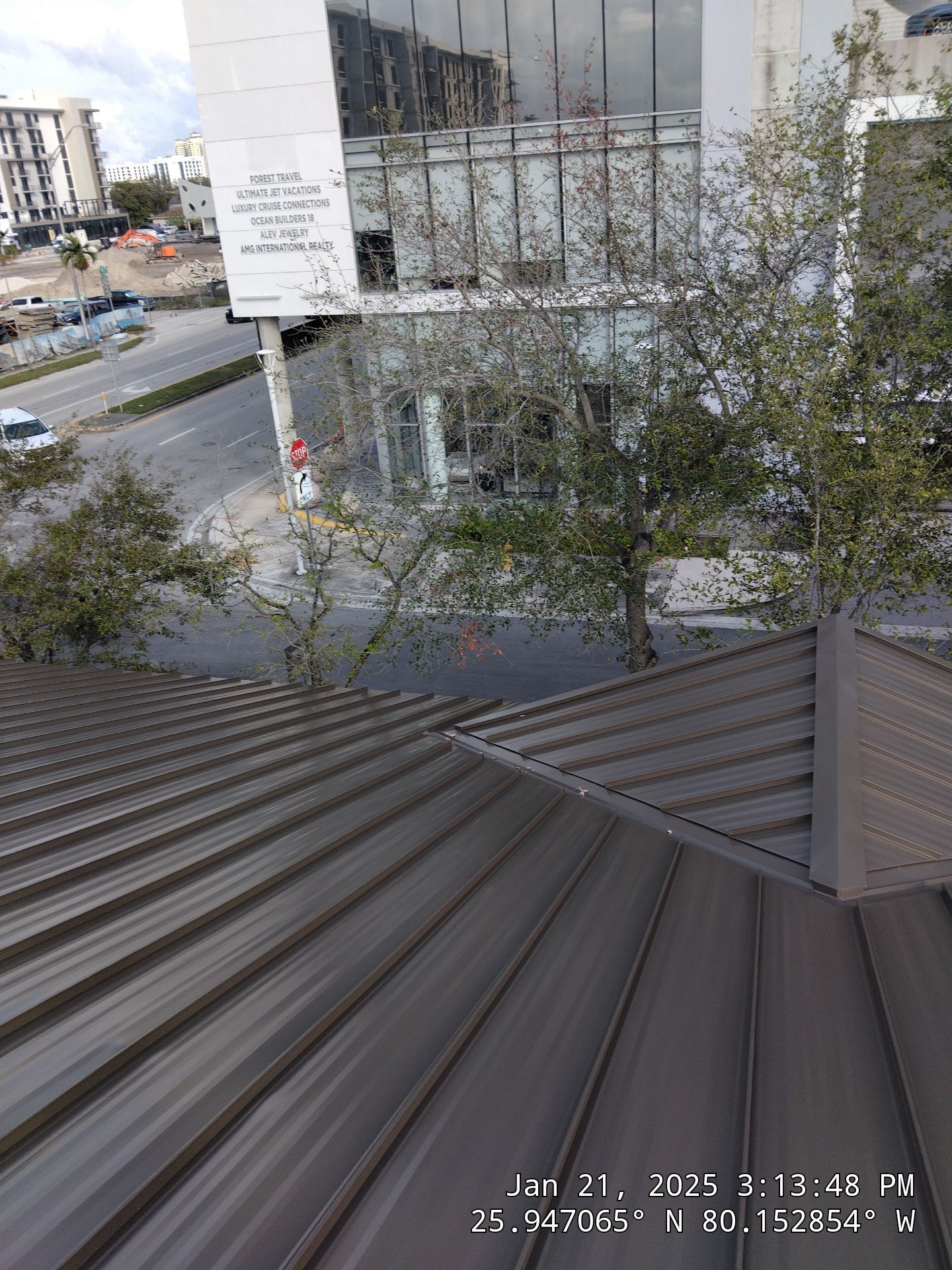 COMMERCIAL REROOF 24 GUAGE MEDIUM BRONZE 1-1/2" MECHANICAL SEAM "ZEBRA METHOD" by Earl W. Johnston Roofing 