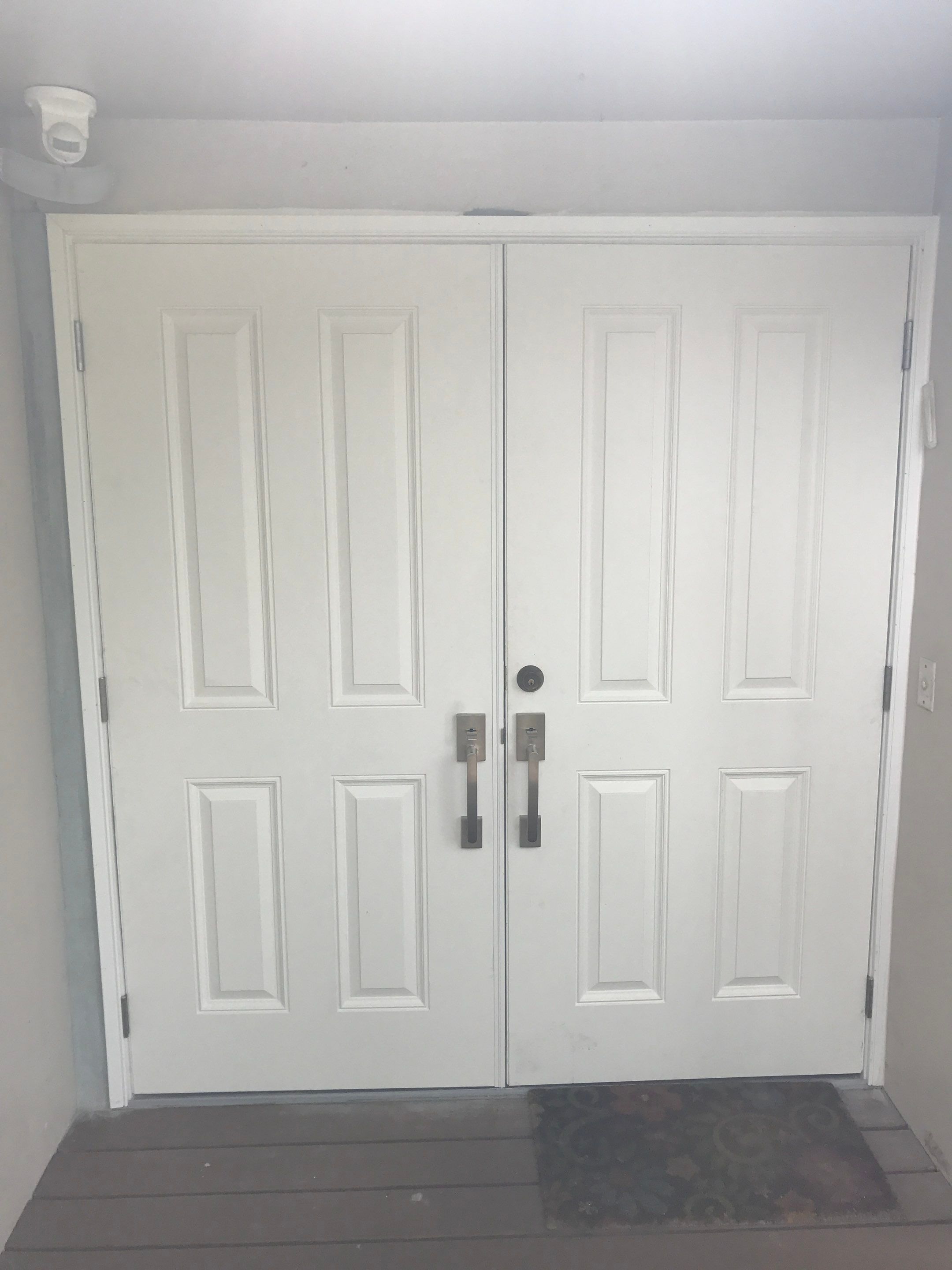 Four-Panel White Double Entry Door Installation in Hollywood by The Door Doctor of South Florida, Inc.