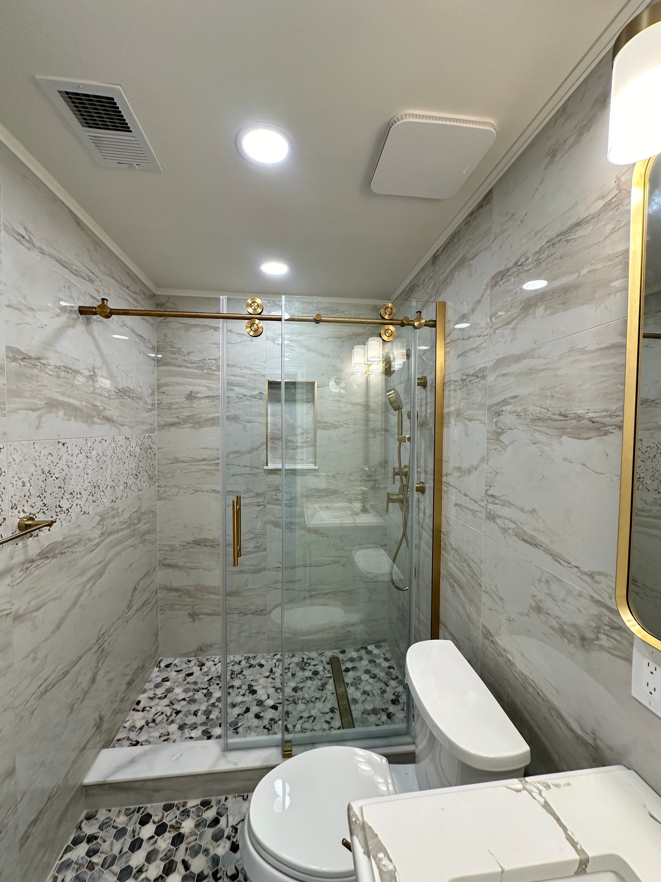 Bathroom Remodel using Tile by Home Concepts Construction