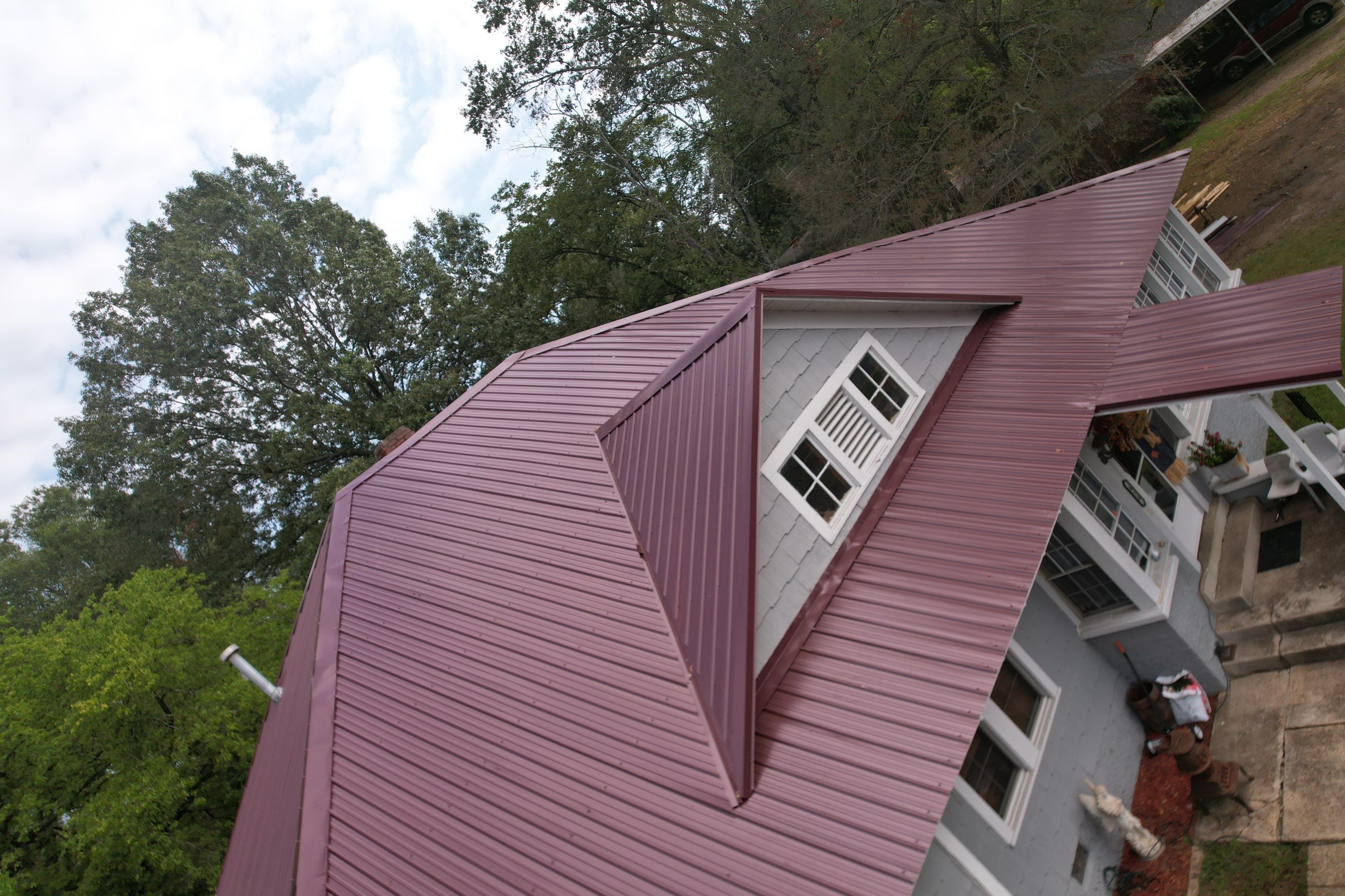 Residential Metal Roof Replacement using Reed's Metals: Colored Residental Panel (Burgundy) by Hostetler Roofing