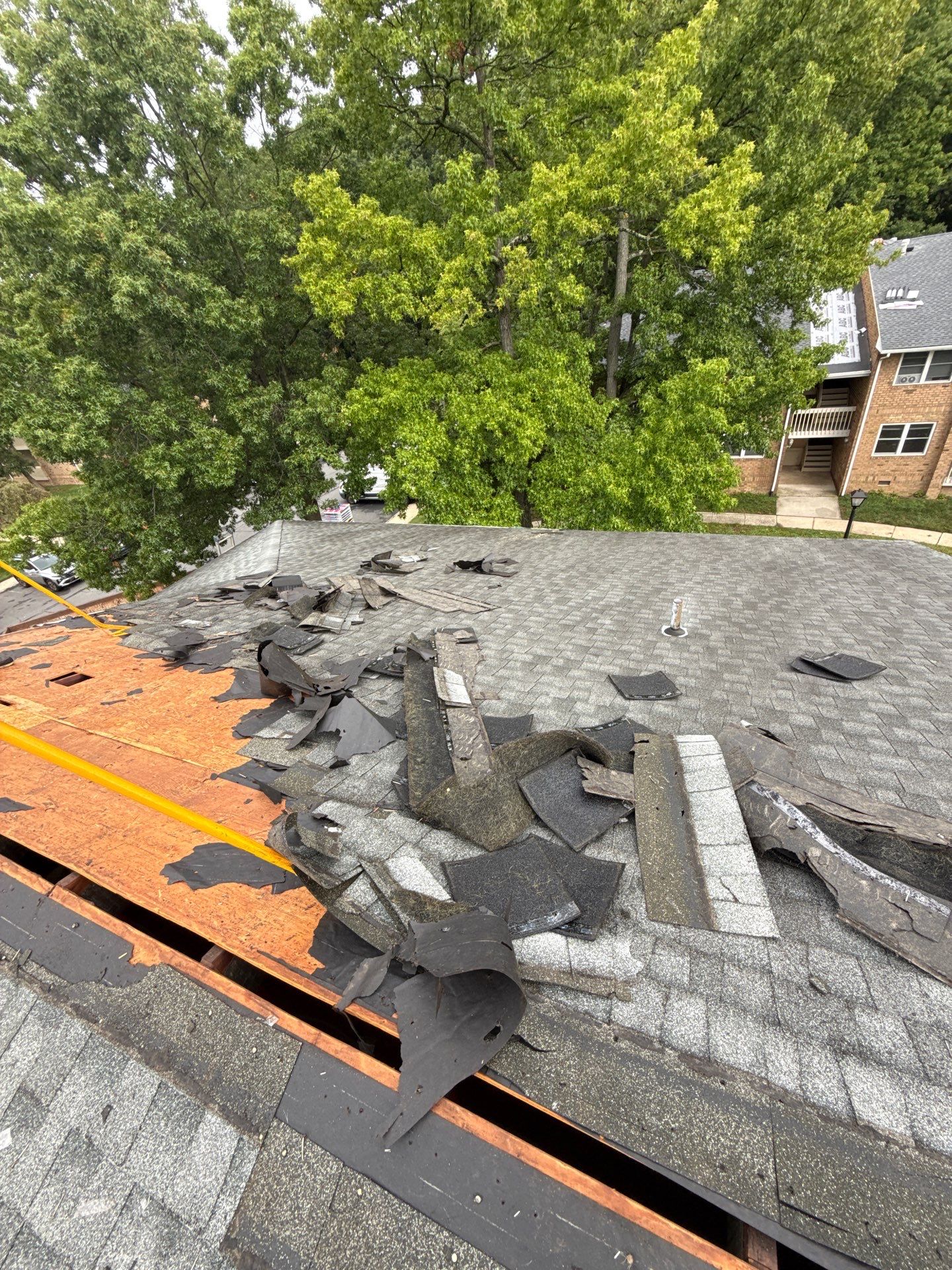 Apartment Complex Roof Replacement and Decking Repair in North Brunswick by JVW ROOFING