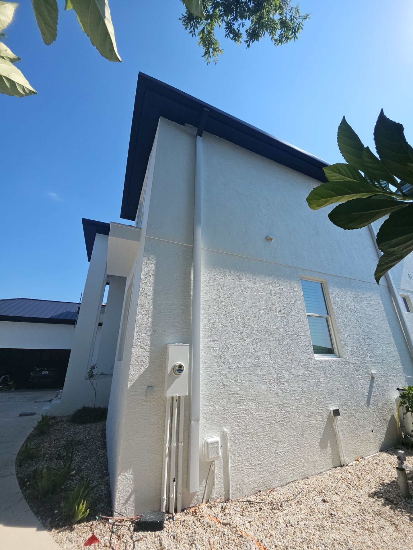 Soffit and Fascia Installation and black seamless gutters in Sarasota FL by Gutter Professors