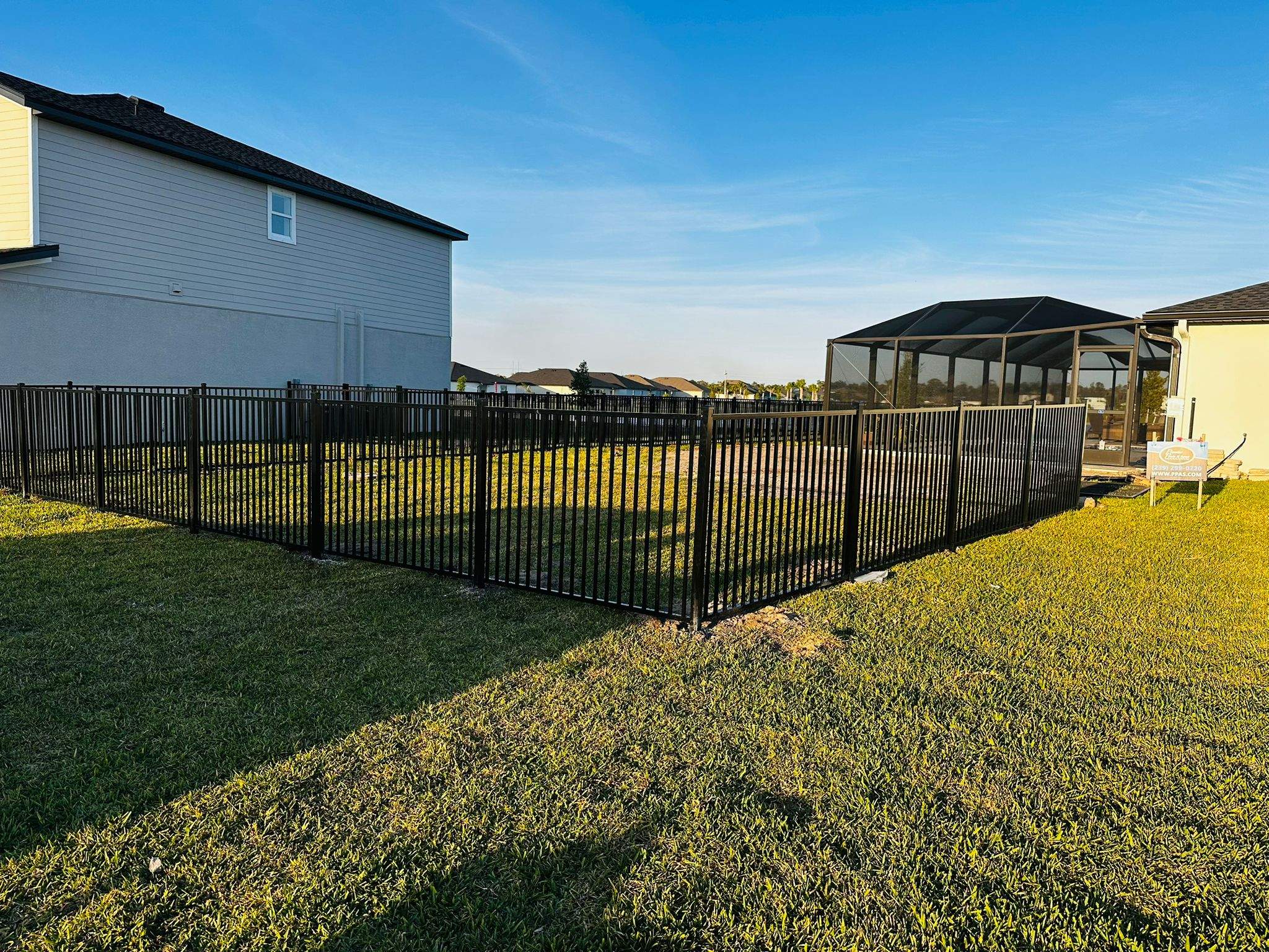 Black Aluminum Picket Fence Installation in North Fort Myers by True Fence LLC